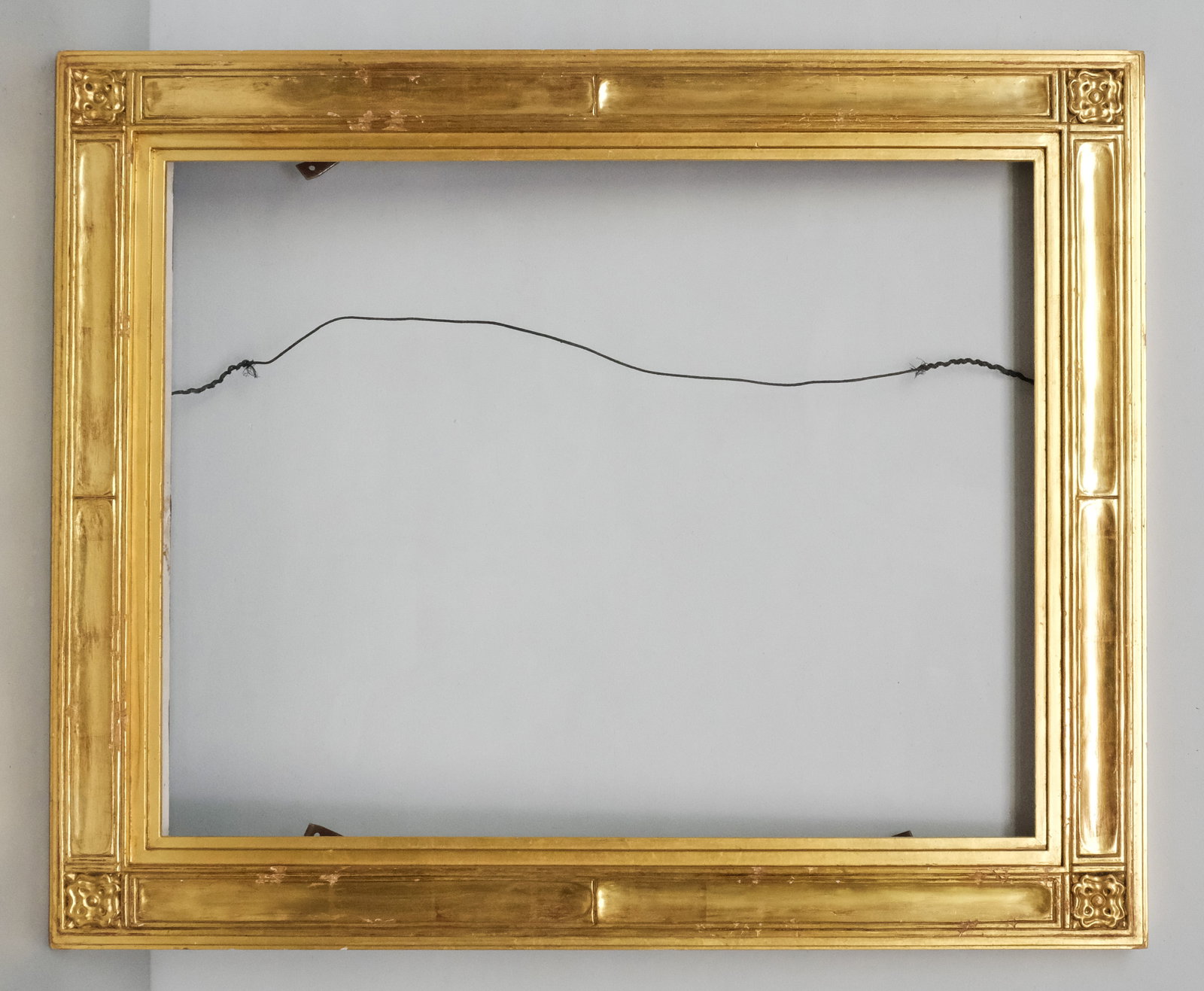 American Giltwood Cassetta Frame 21 3/4" x 28": American, 20th century, finely wrought custom giltwood cassetta frame in the style of Newcomb Macklin or Carrig-Rohane. Overall 28 3/4" x 35", rabbet 21 3/4" x 28", 3 3/4" molding