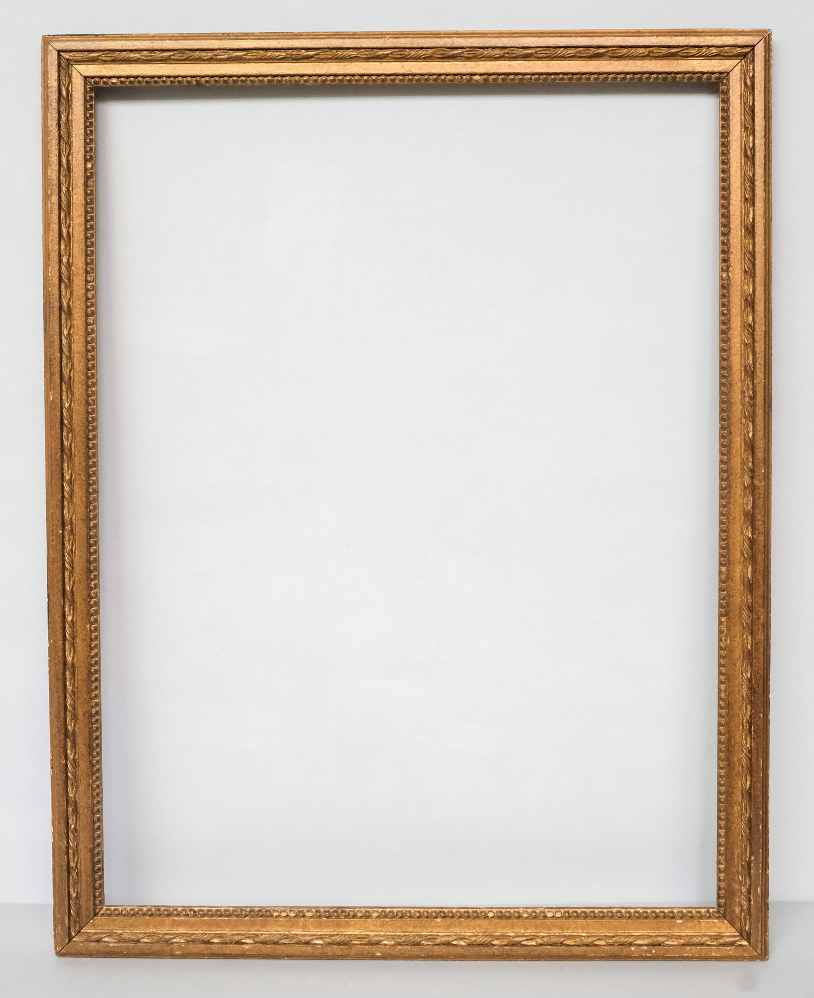 Louis XVI Giltwood Frame 24 1/2" x 32 1/2": American, 20th century, carved and gilded in the French taste. Overall 28" x 36", rabbet 24 1/2" x 32 1/2", 2" molding