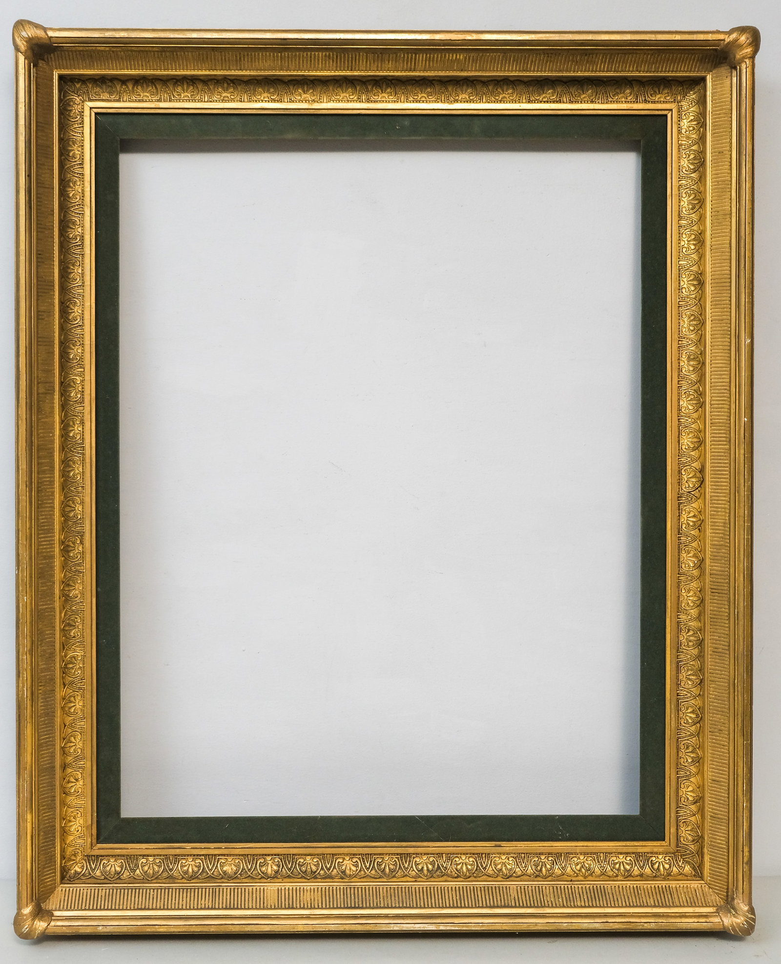 Hudson River School Gilt Frame 24" x 31": American, ca. 1870, having fluted bevel with anthemion decorated cove and fabric liner. Overall 33" x 40", rabbet 24" x 31", 4 3/4" molding