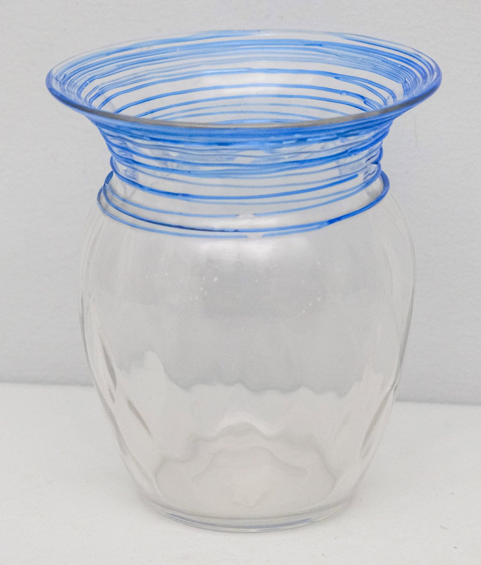 Steuben Optic Thread Art Glass Vase: Optical design under rows of blue threading. 6 1/4" x 5 1/2" diameter. Unmarked