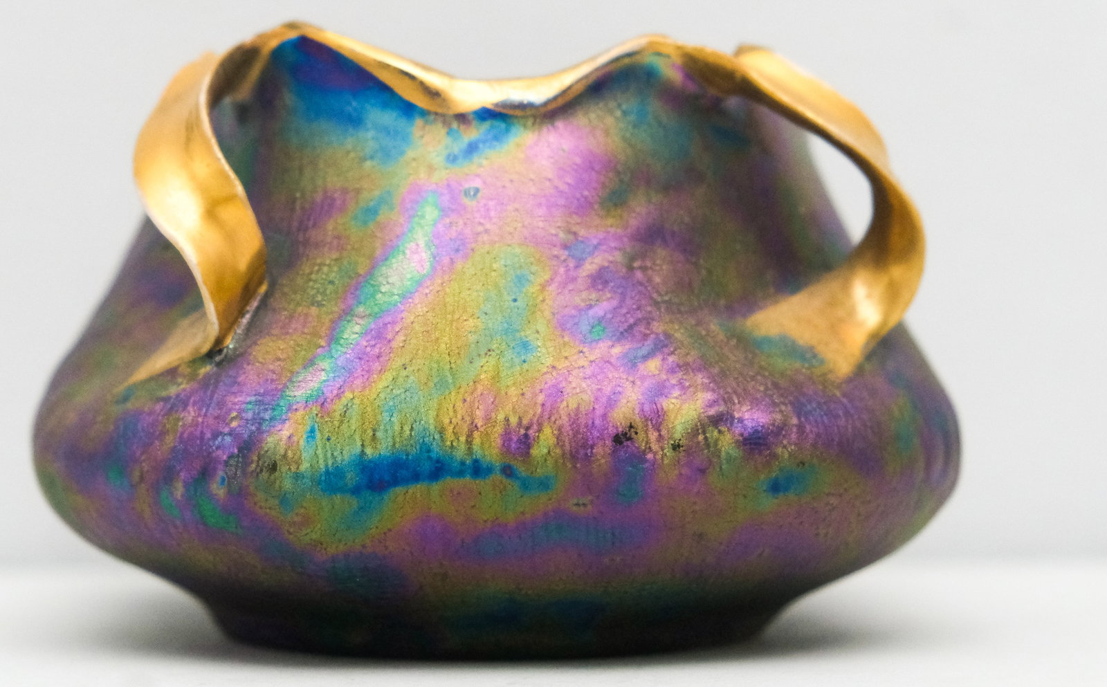 Antique Crown Carlsbad Pottery Bowl: Iridescent body with organic gold handles. Marked as shown. 3 1/4" H x 5" diameter
