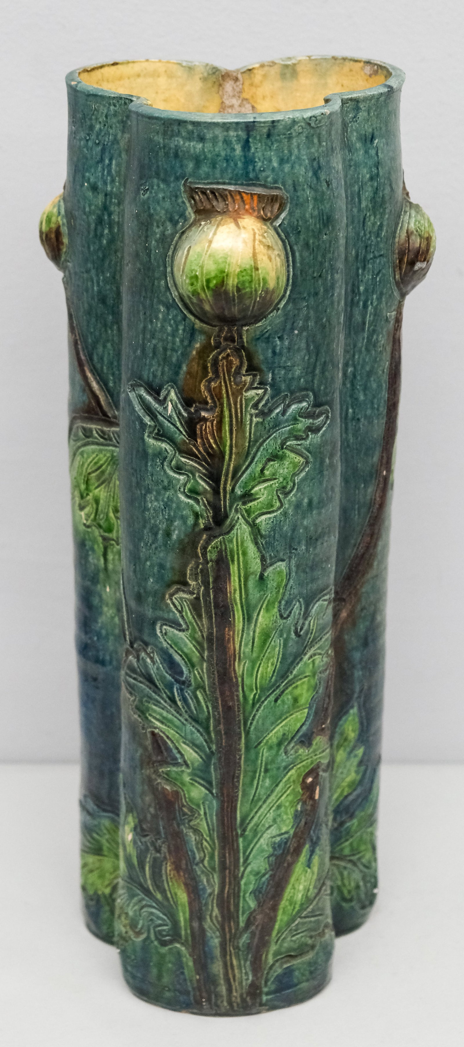 Antique Large Art Pottery Thistle Vase: Large trefoil shaped vase with repousse thistle and incised floral detail. Incised artist's signature of "MK" to side. Likely French? 15 3/4".