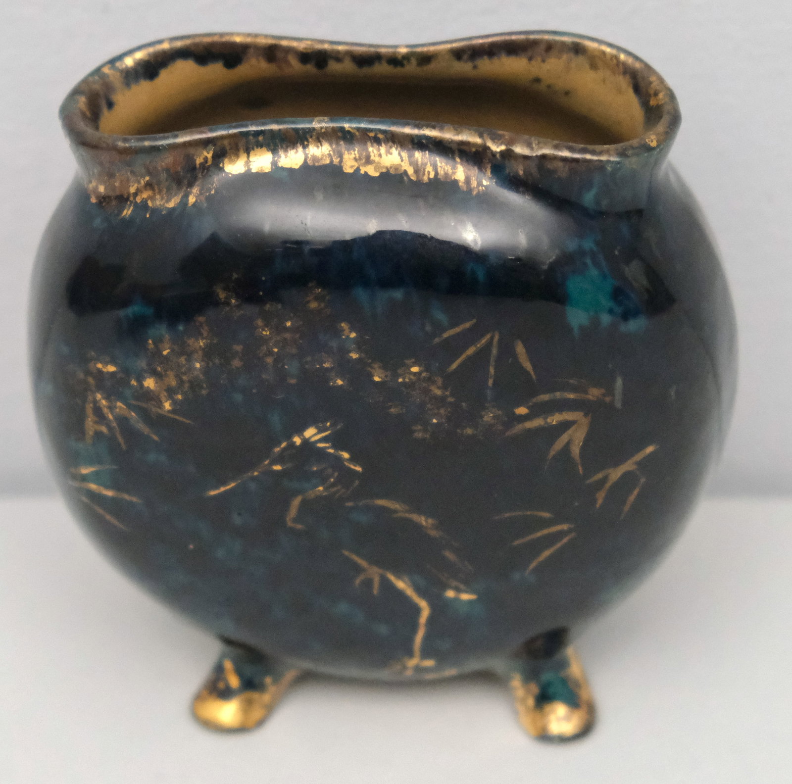 Early Rookwood Pottery Orientalist Vase: Organic four-footed form in mottled blue glaze with gilt crane. Marked as shown. 4 1/2"
