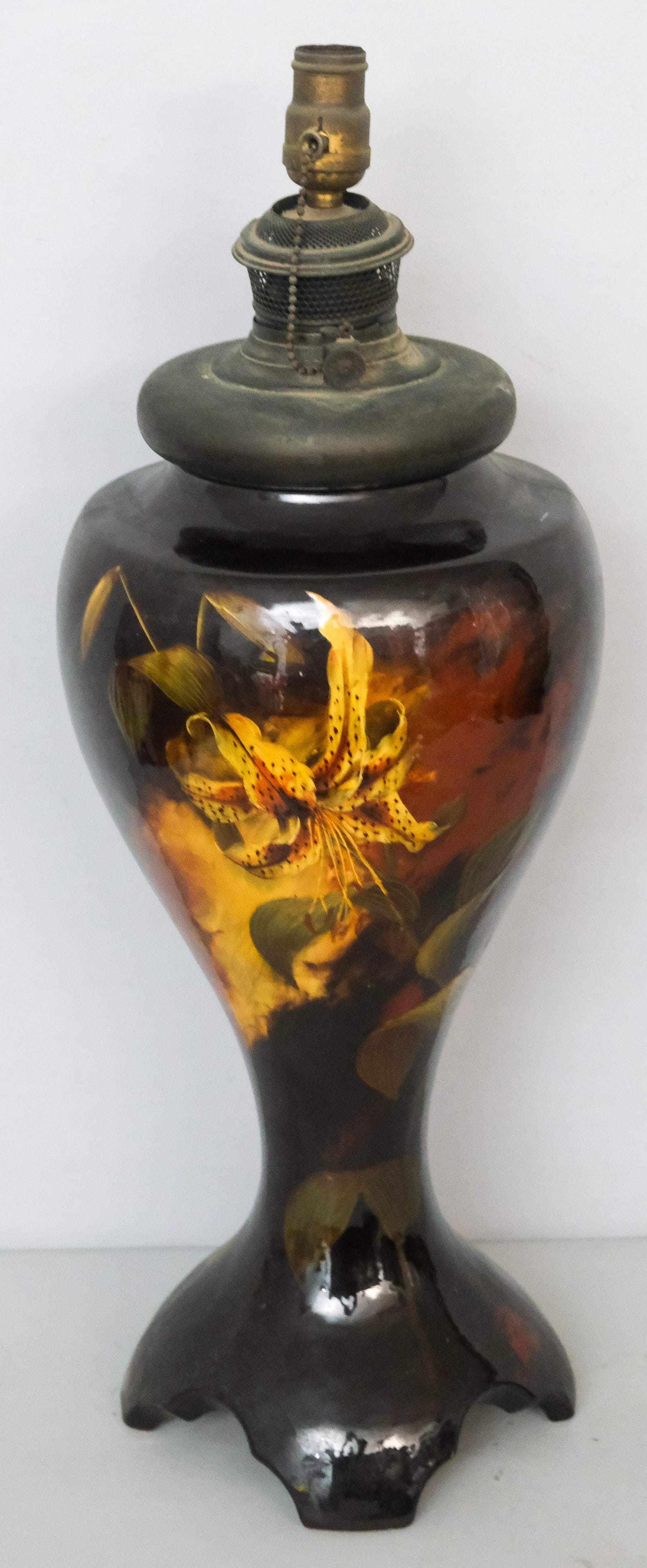 Large Weller Aurelian Art Pottery Lamp: Large body with four formed feet. Decorated in tiger lillies on standard glaze. 27 1/4". Now electrified. Marked as shown.
