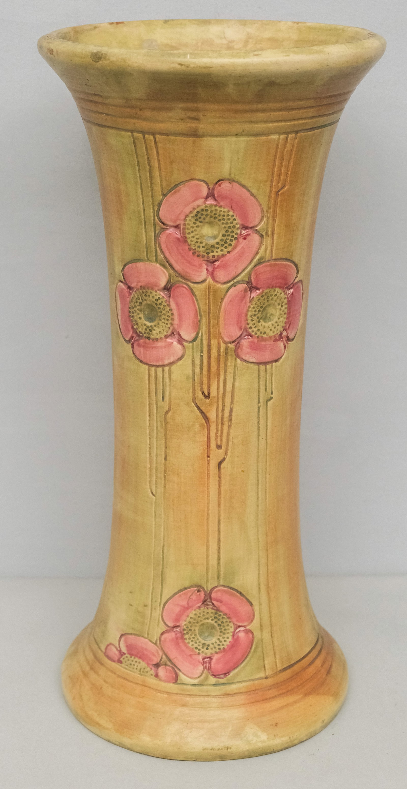 Weller Art Pottery Flemish Umbrella Stand: Stylized red flowers with long stems over streaked body. 23 1/2".