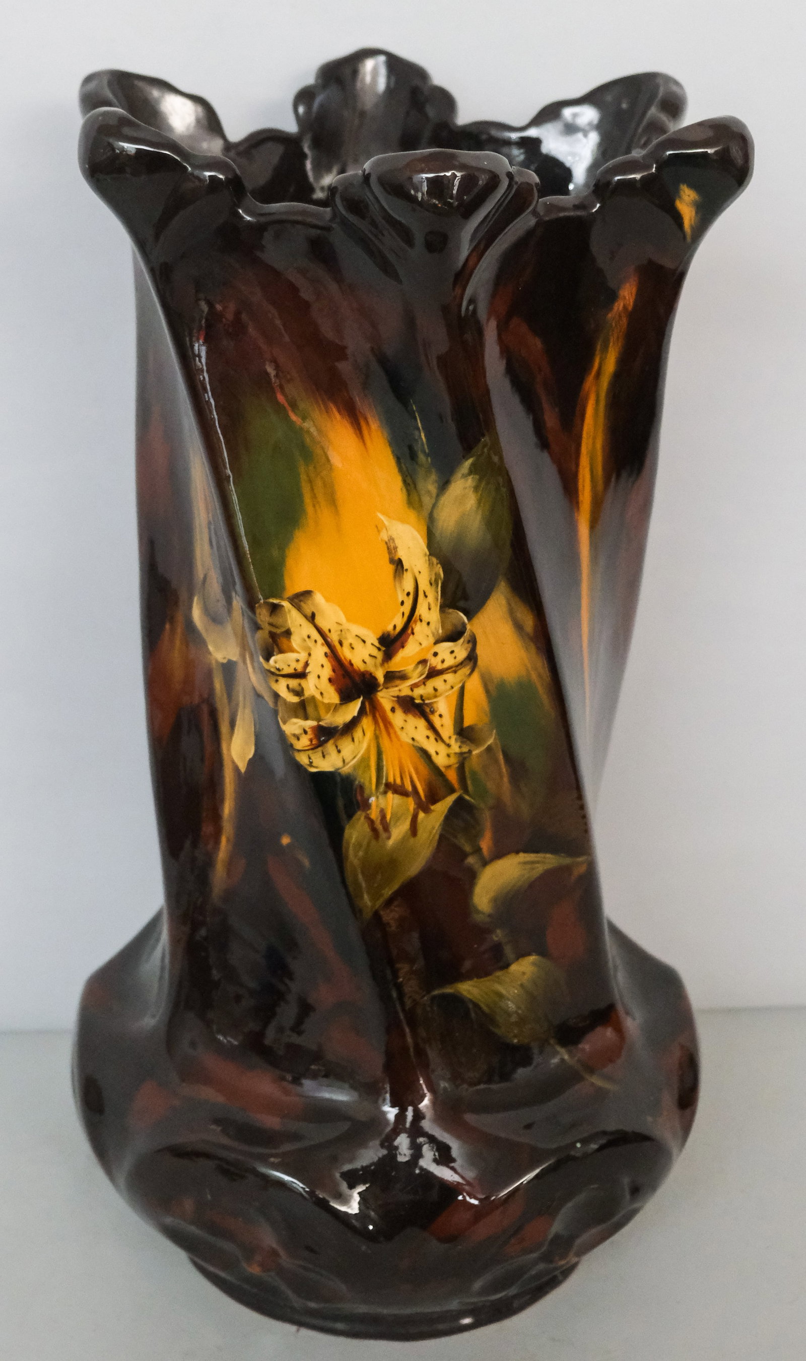 Weller Aurelian Art Pottery Umbrella Stand: Decorated with blooming tiger lillies on large swirled body, signed by decorator Minnie Mitchell. Marked as shown.23 1/8".