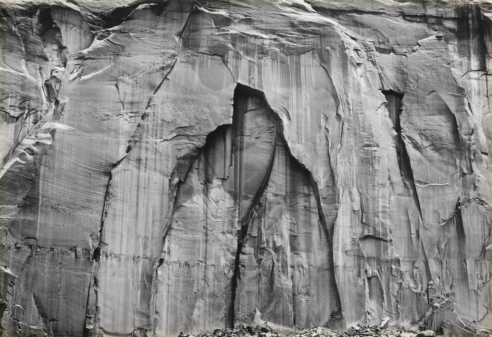 PAUL CAPONIGRO - Monument Valley, Utah, 1970: This print was produced in 1973 for inclusion in Portfolio II (Edition of 100). Signed in pencil mount recto. Materials & Techniques: Vintage Silver Gelatin