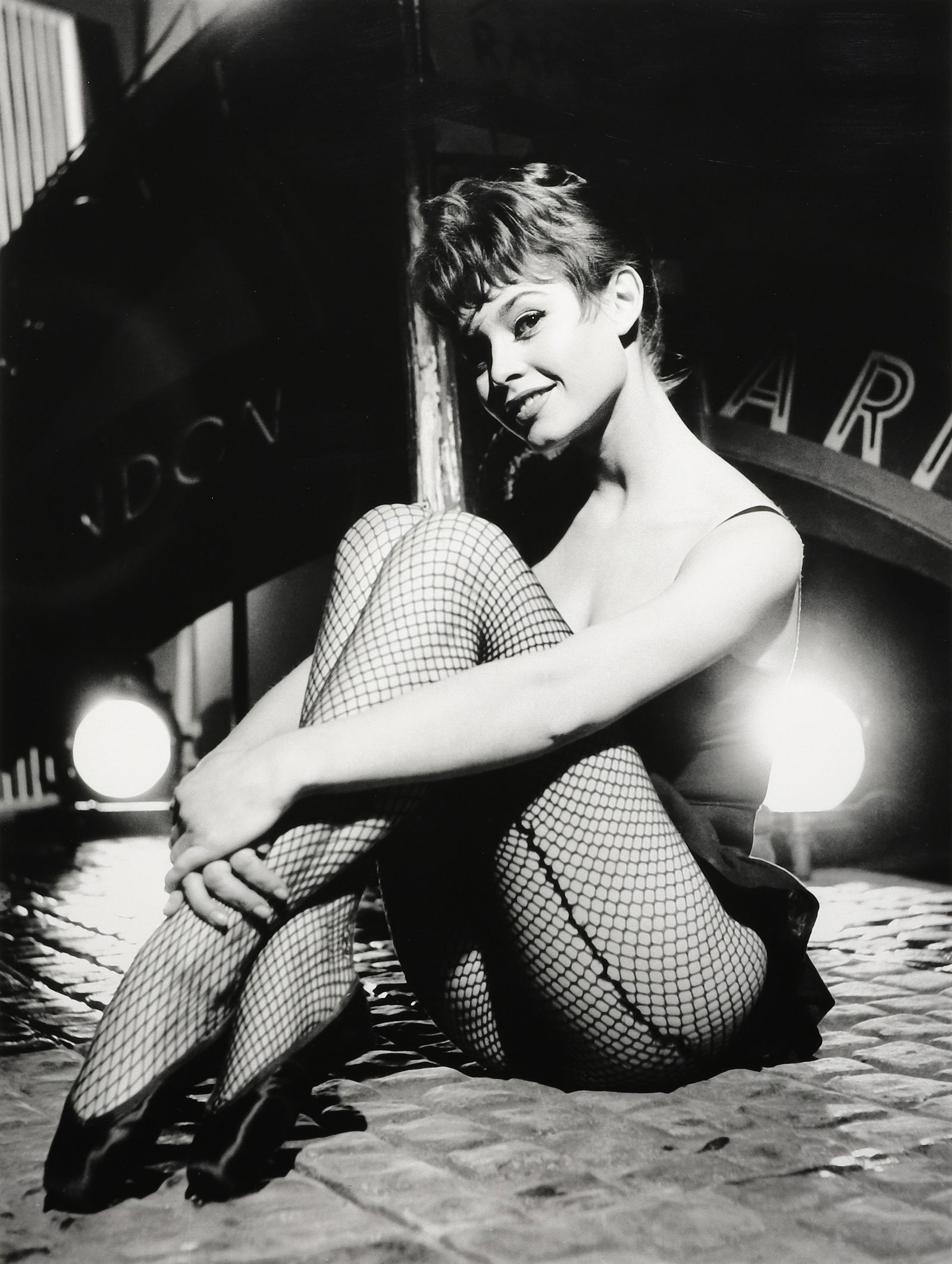 CORNEL LUCAS - Brigitte Bardot, 1948: Signed in ink with the photographer's copyright stamp mount verso. Materials & Techniques: Silver Gelatin