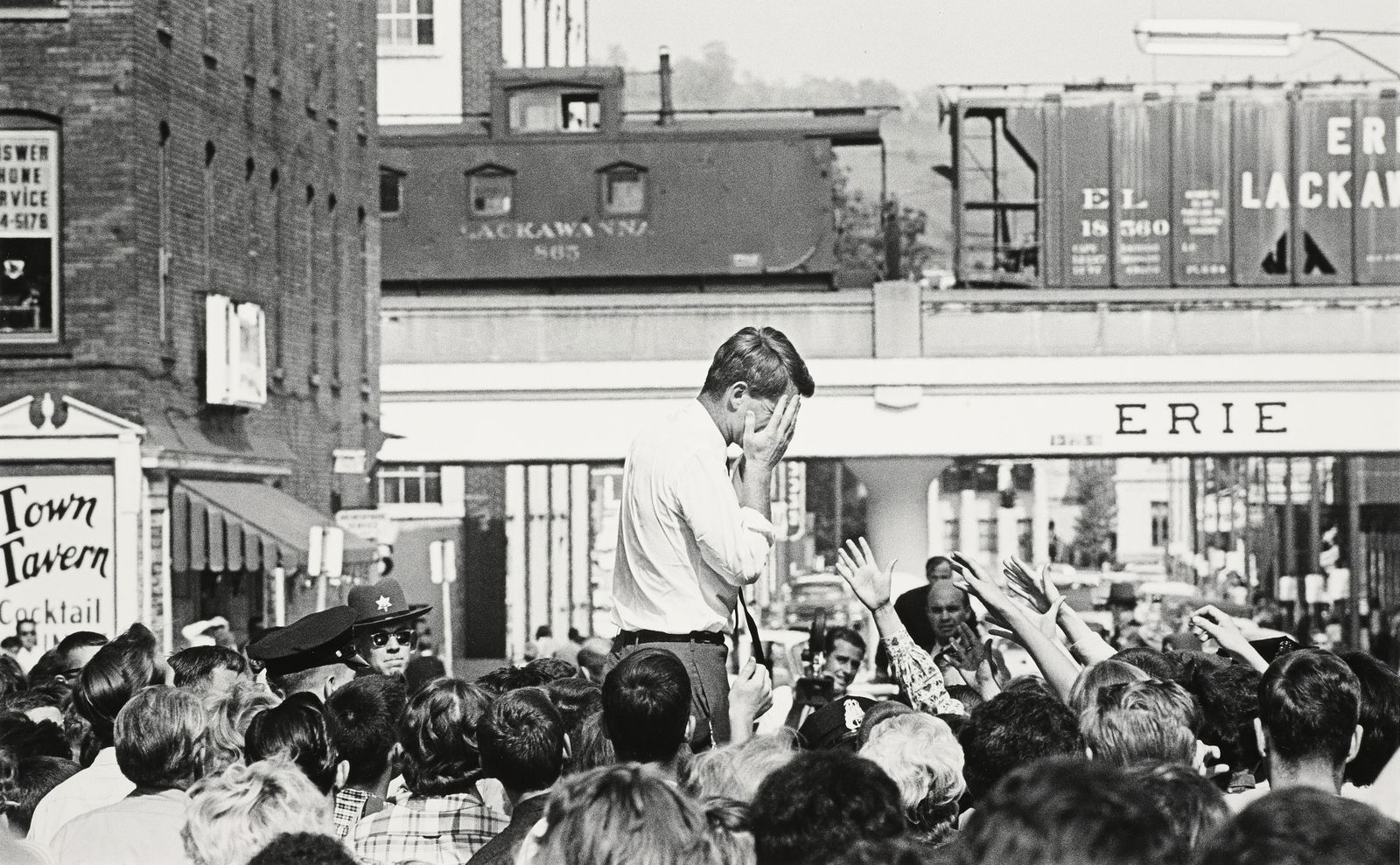 CORNELL CAPA - Robert F. Kennedy, Buffalo [Hands to: Signed, titled & dated in ink on photographers stamp. Materials & Techniques: Silver Gelatin