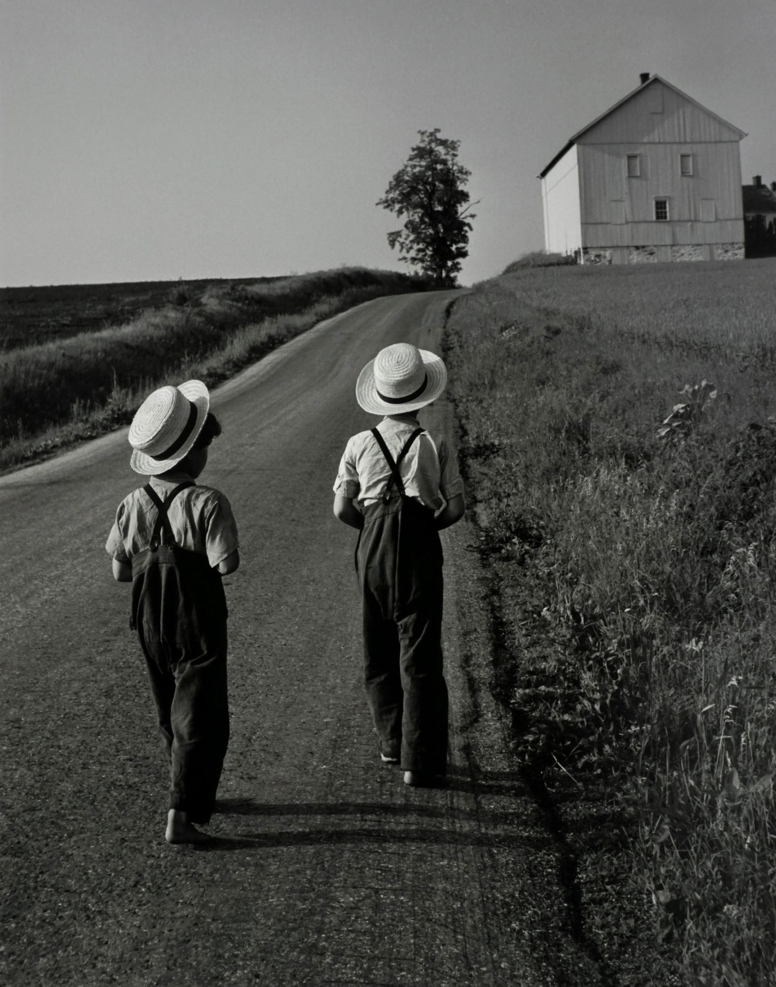 GEORGE TICE - Two Amish Boys, Lancaster, Pennsylvania,: ARTIST: GEORGE TICE TITLE: "Two Amish Boys, Lancaster, Pennsylvania, 1962" MEDIUM: Mounted silver gelatin print. Printed 1998. SIZE: Image - 10 3/8" x 13 ¼", Mount - 14" x 17", Mat - 16" x 20"