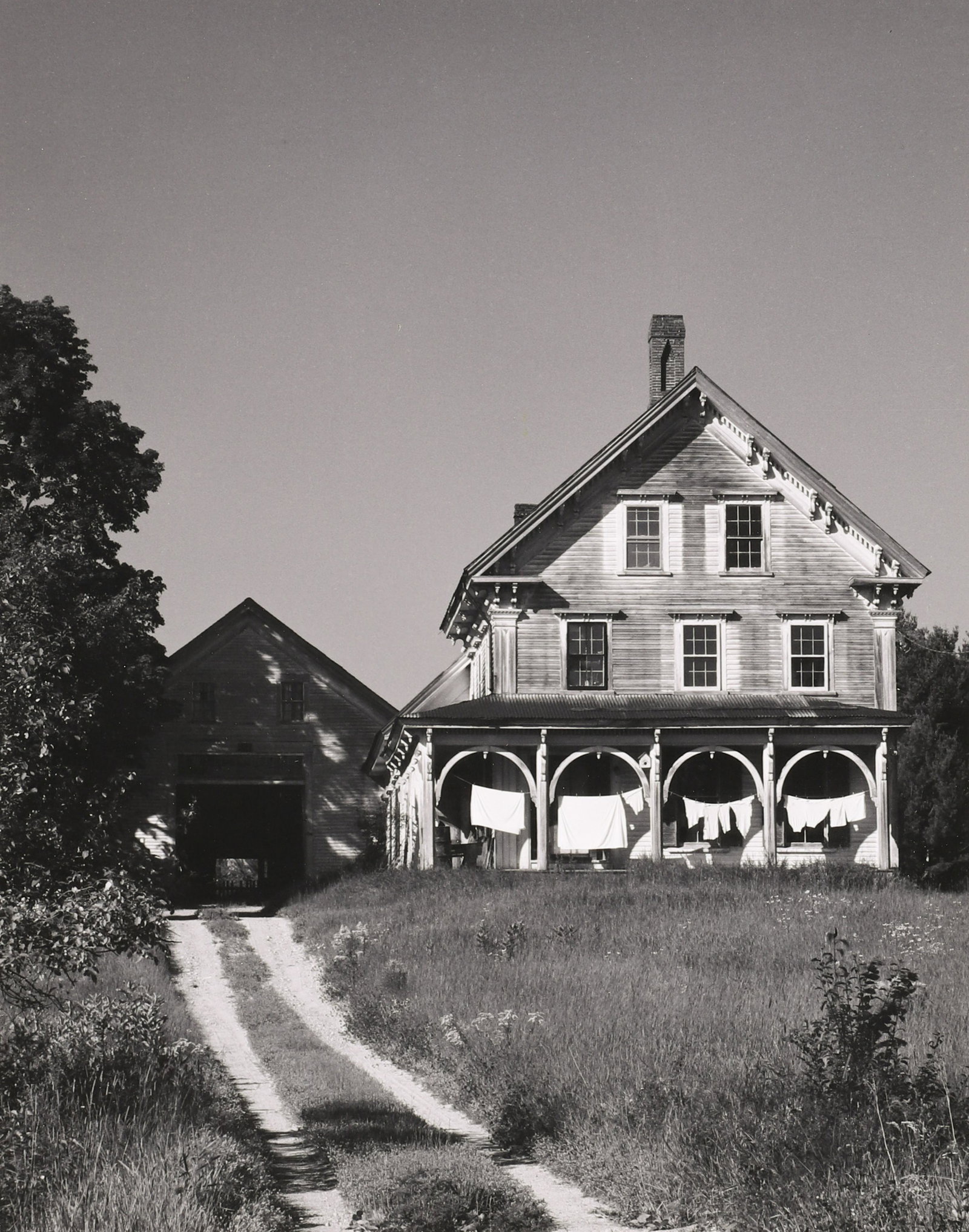 HENRY GILPIN - House and Barn, CA, 1977: ARTIST: HENRY GILPIN TITLE: 'House and Barn, CA, 1977' MEDIUM: Vintage Silver Gelatin IMAGE SIZE: 9 3/4 x 7 5/8 in DESCRIPTION: This vintage silver gelatin print is signed and dated in pencil mount re