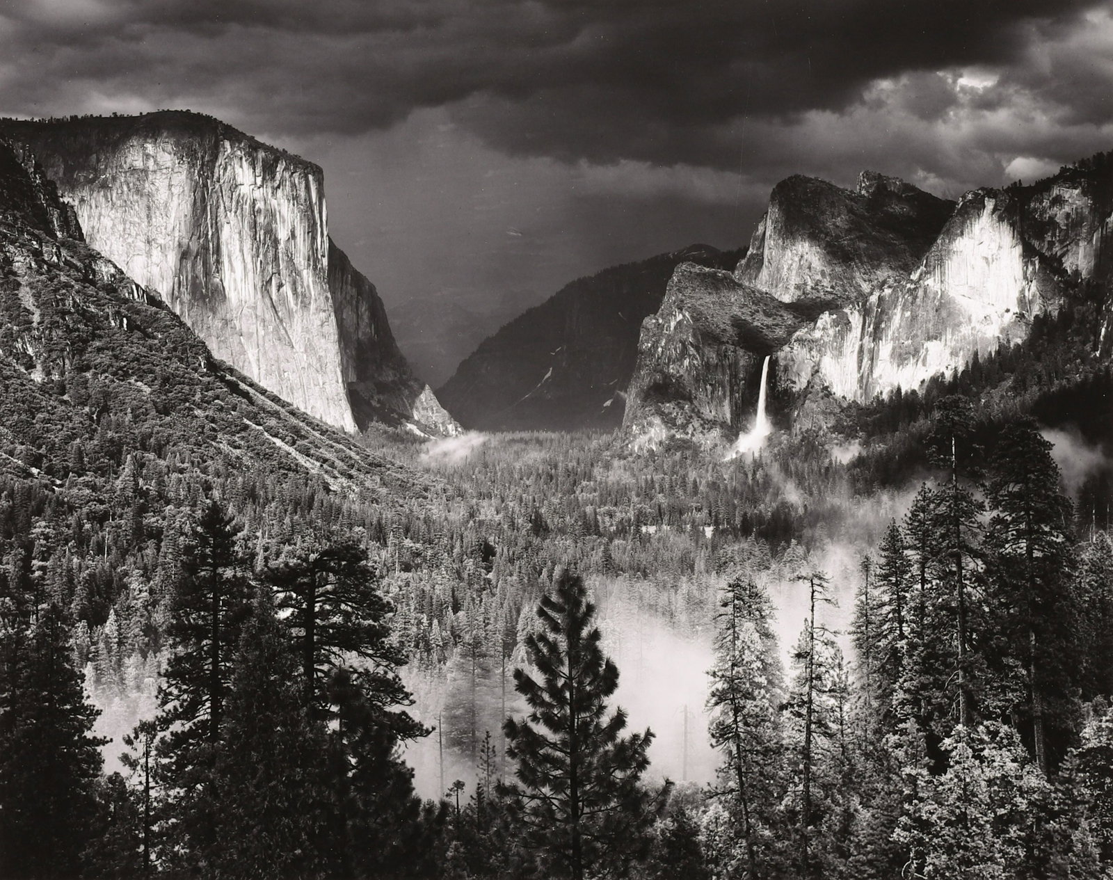 ANSEL ADAMS - Thunderstorm, Yosemite Valley, CA, c.: ARTIST: ANSEL ADAMS TITLE: 'Thunderstorm, Yosemite Valley, CA, c. 1940' MEDIUM: Silver Gelatin IMAGE SIZE: 7 1/2 x 9 1/2 in DESCRIPTION: This characteristic Ansel Adams photograph from Inspiration Poi