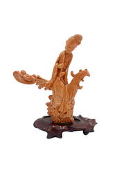 An important and elegant Chinese Coral figure of a female immortal