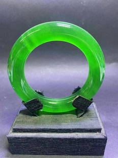 JADEITE BRACELET: Name JADEITE BRACELET Material JADEITE Dimensions ID5.9CM 119.9G Condition Additional photographs and Condition reports are provided by request as a courtesy to our clients, as such any