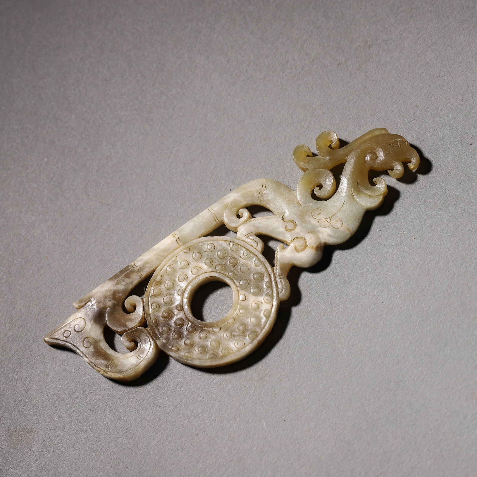 Carved Jade Phoenix-Form Ornament: Name Carved Jade Phoenix-Form Ornament Dimensions Length:12cm, Width:4.2cm, Condition Additional photographs and Condition reports are provided by request as a courtesy to our clients, as