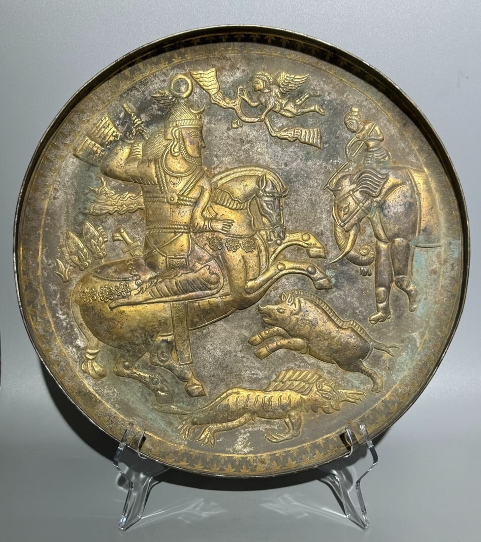 TANG DYNASTY GILT SILVER PERSIAN CULTURAL PLATE: Name TANG DYNASTY GILT SILVER PERSIAN CULTURAL PLATE Dimensions D:36CM Condition Additional photographs and Condition reports are provided by request as a courtesy to our clients, as