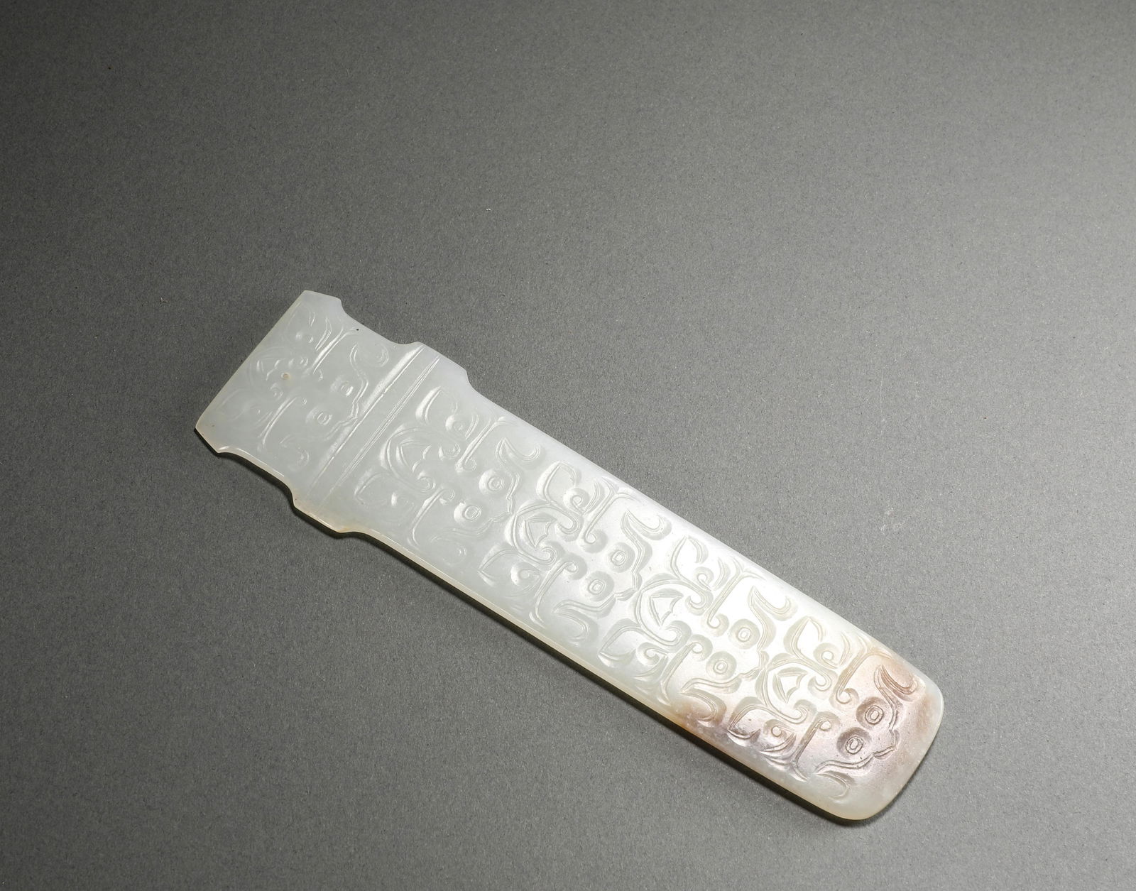 Shang Dynasty Hetian jade: Name Shang Dynasty Hetian jade Dimensions H:14.8cm W:4.2cm Weight:50g Condition Additional photographs and Condition reports are provided by request as a courtesy to our clien