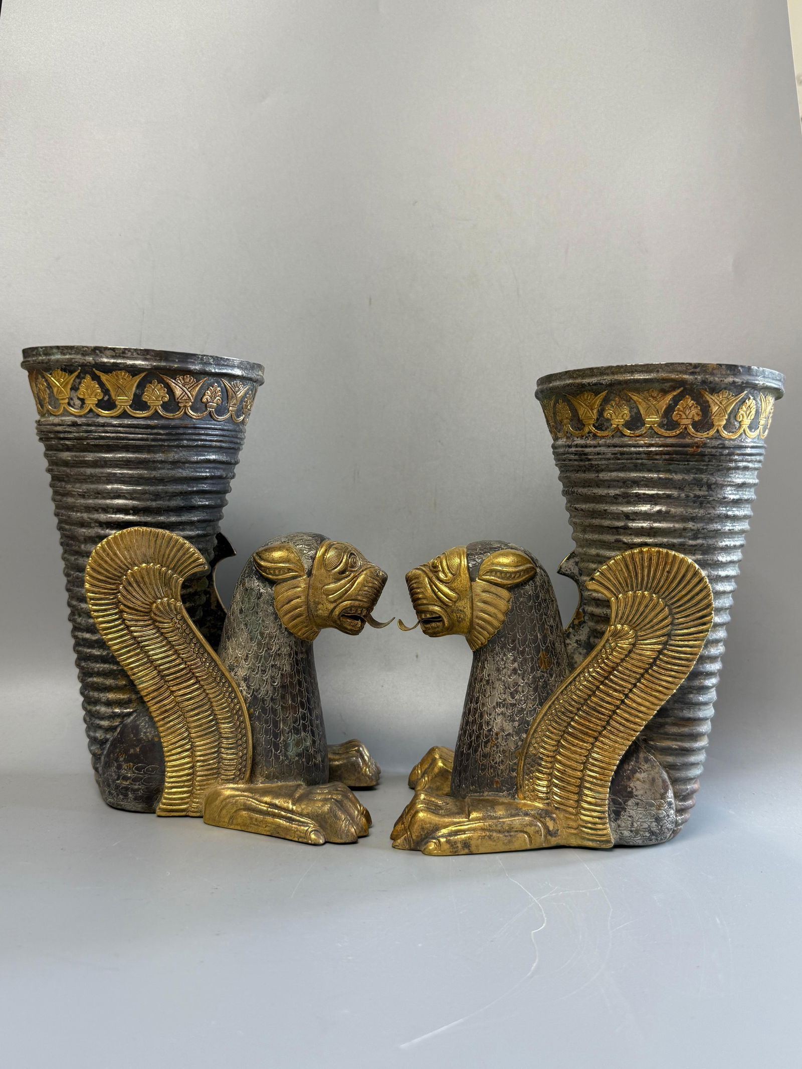 TANG DYNASTY SILVER GILDED PERSIAN LAI TONG CUP: Name TANG DYNASTY SILVER GILDED PERSIAN LAI TONG CUP Dimensions H:20CM L:14CM Condition Additional photographs and Condition reports are provided by request as a courtesy to our clients,