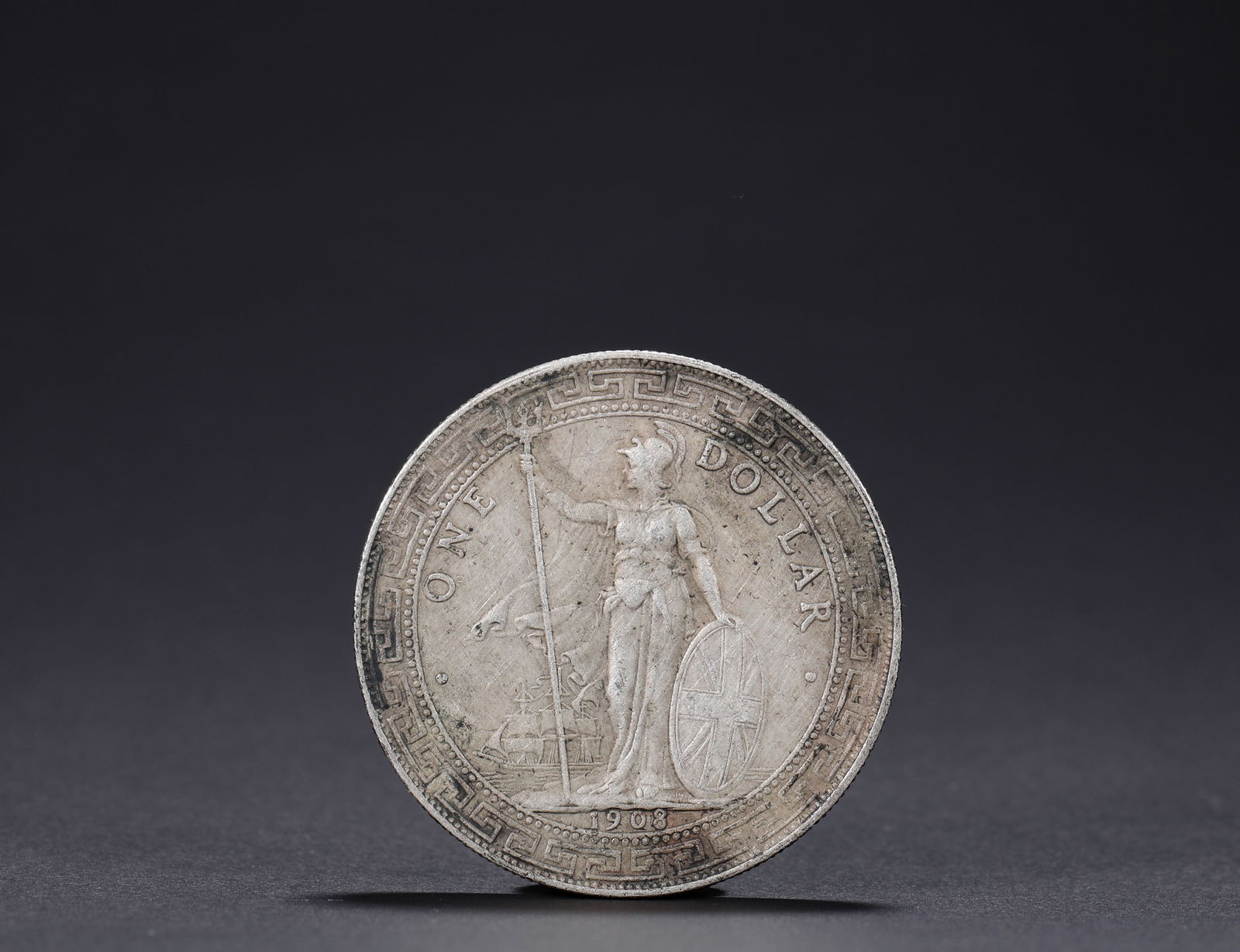 The 1908 Station Man silver coin (1 of 3)