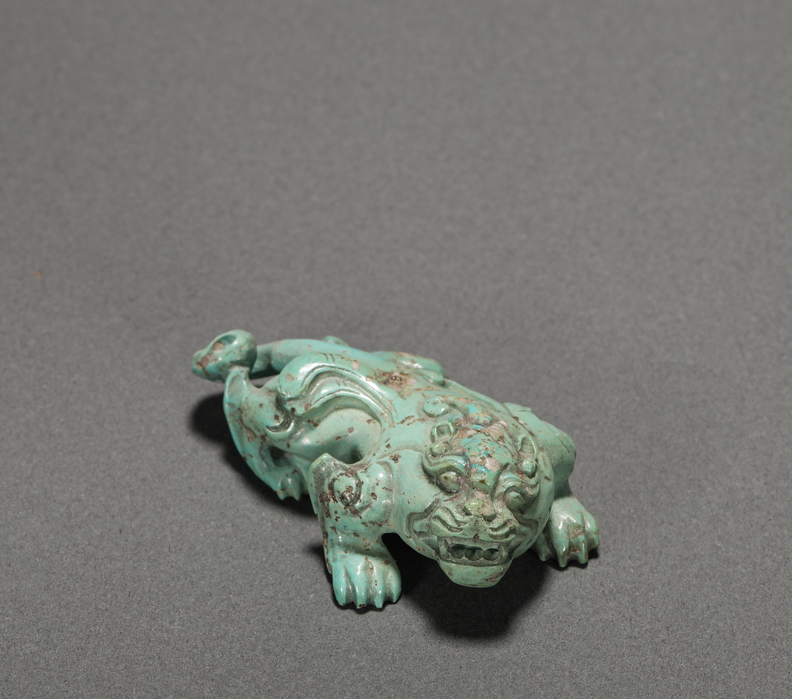 HAN DYNASTY TURQUOISE AUSPICIOUS BEASTS: Name HAN DYNASTY TURQUOISE AUSPICIOUS BEASTS Dimensions H:2cm W:5.5cm Weight:27g Condition Additional photographs and condition reports are available upon request as a c