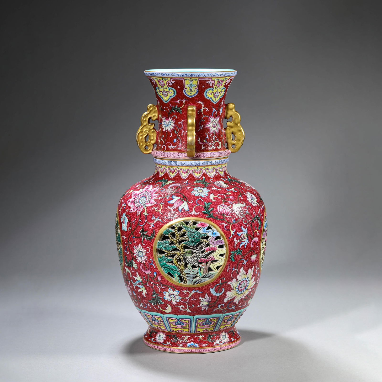 Famille-Rose "Revolving" Vase On A Red Ground: Name Famille-Rose "Revolving" Vase On A Red Ground Dimensions Width:19cm Height:36.5cm Condition Additional photographs and condition reports are available upon request as a courtesy to our