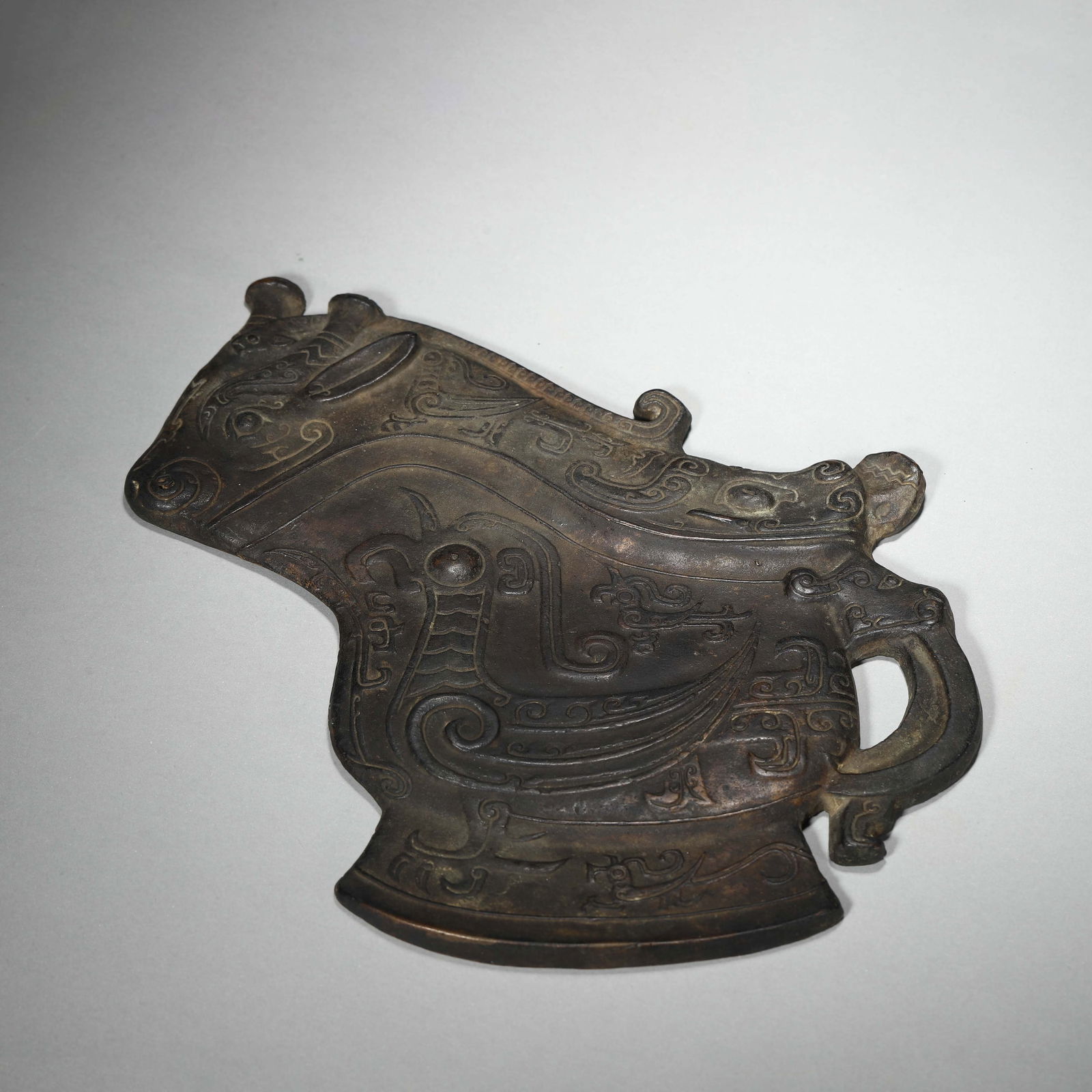 Bronze "Animal-Mask" Ornament: Name Bronze "Animal-Mask" Ornament Dimensions Length:16.5cm Width:17.4cm Condition Additional photographs and condition reports are available upon request as a courtesy to our client