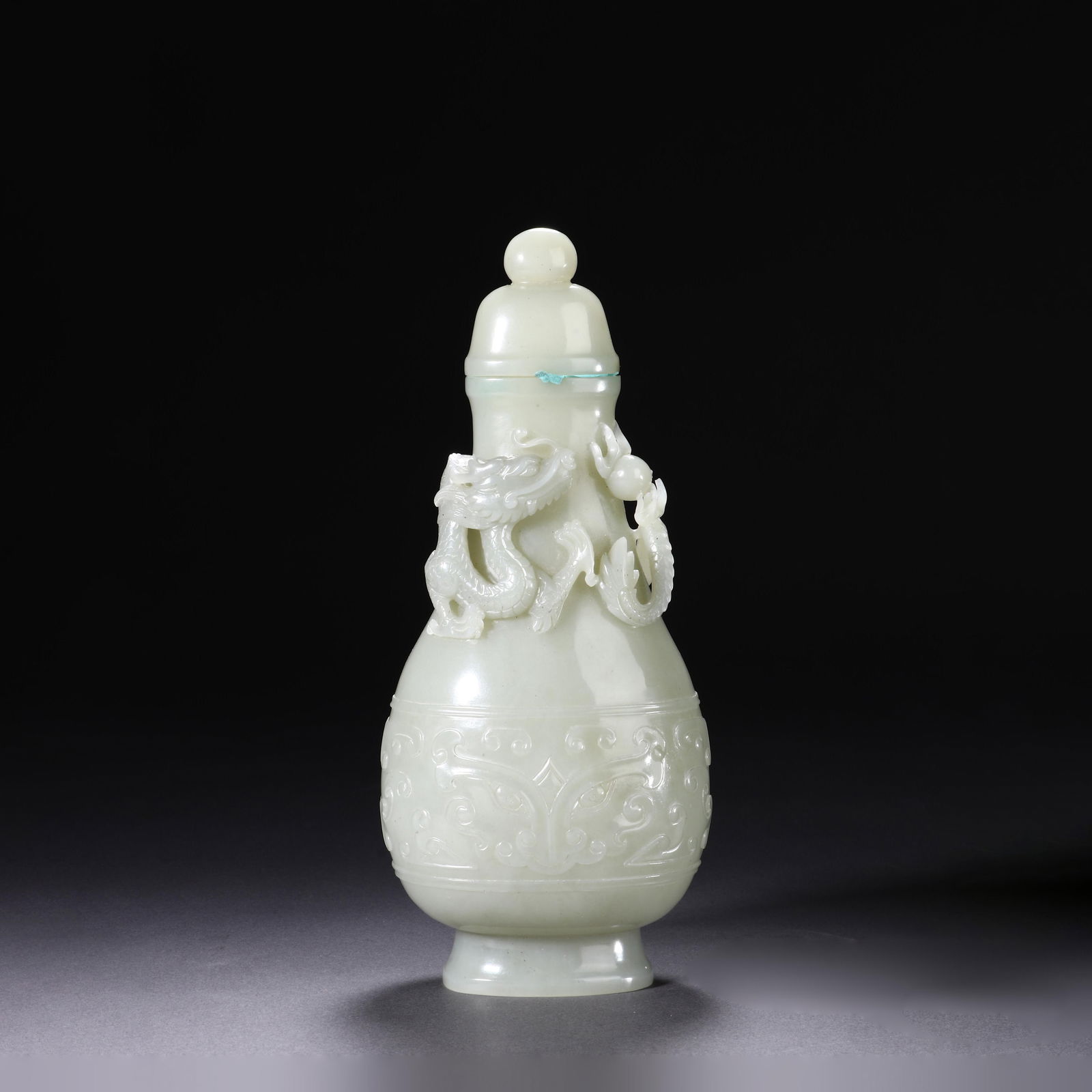 Carved-Jade "Dragon" Vase: Name Carved-Jade "Dragon" Vase Dimensions Height:20.5cm Width:8.8cm Condition Additional photographs and condition reports are available upon request as a courtesy to our clients. An