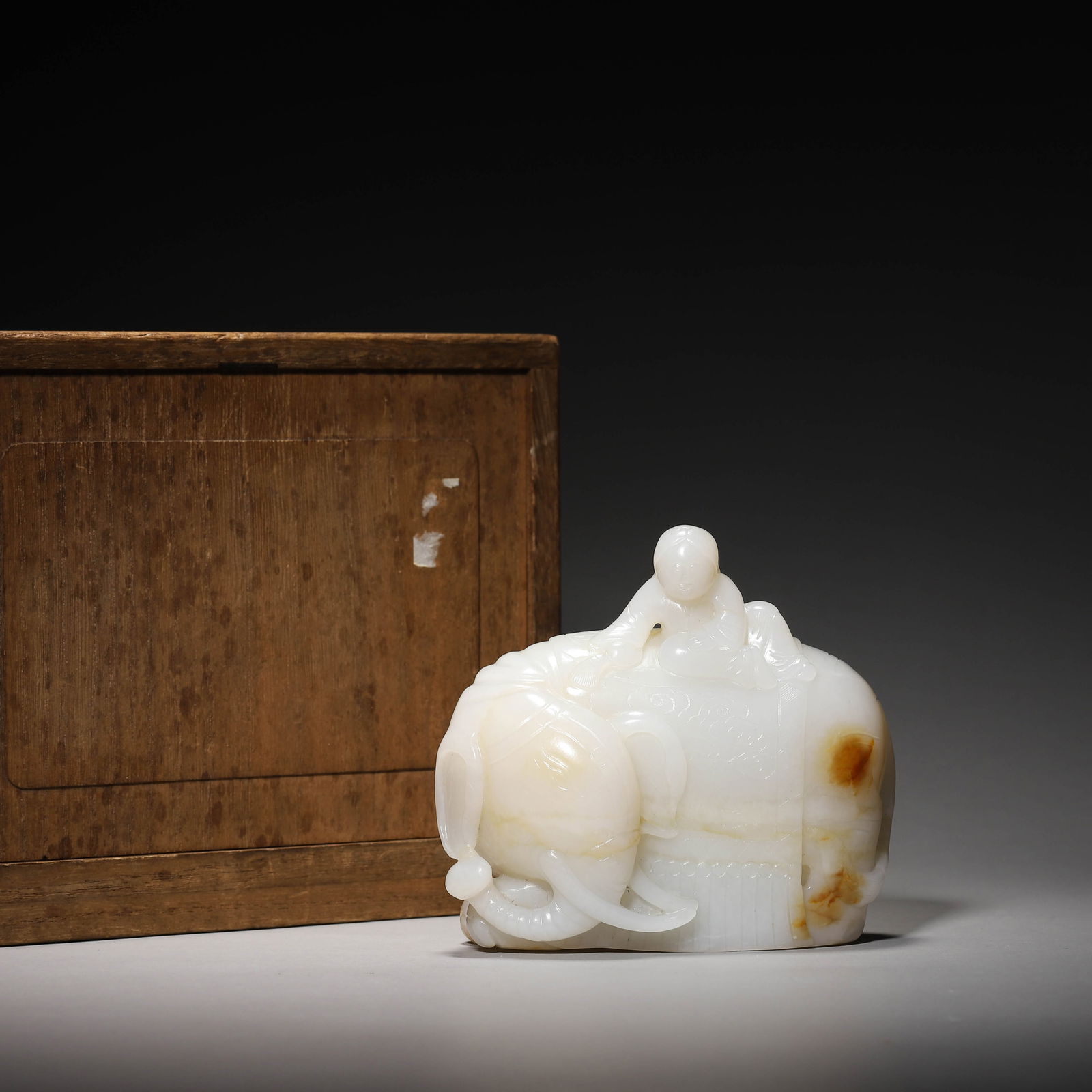 Carved Jade Boy and Elephant Ornament: Name Carved Jade Boy and Elephant Ornament Dimensions Length:10cm, Width:5cm, Height:9.5cm, ? Condition Additional photographs and condition reports are available upon request as a