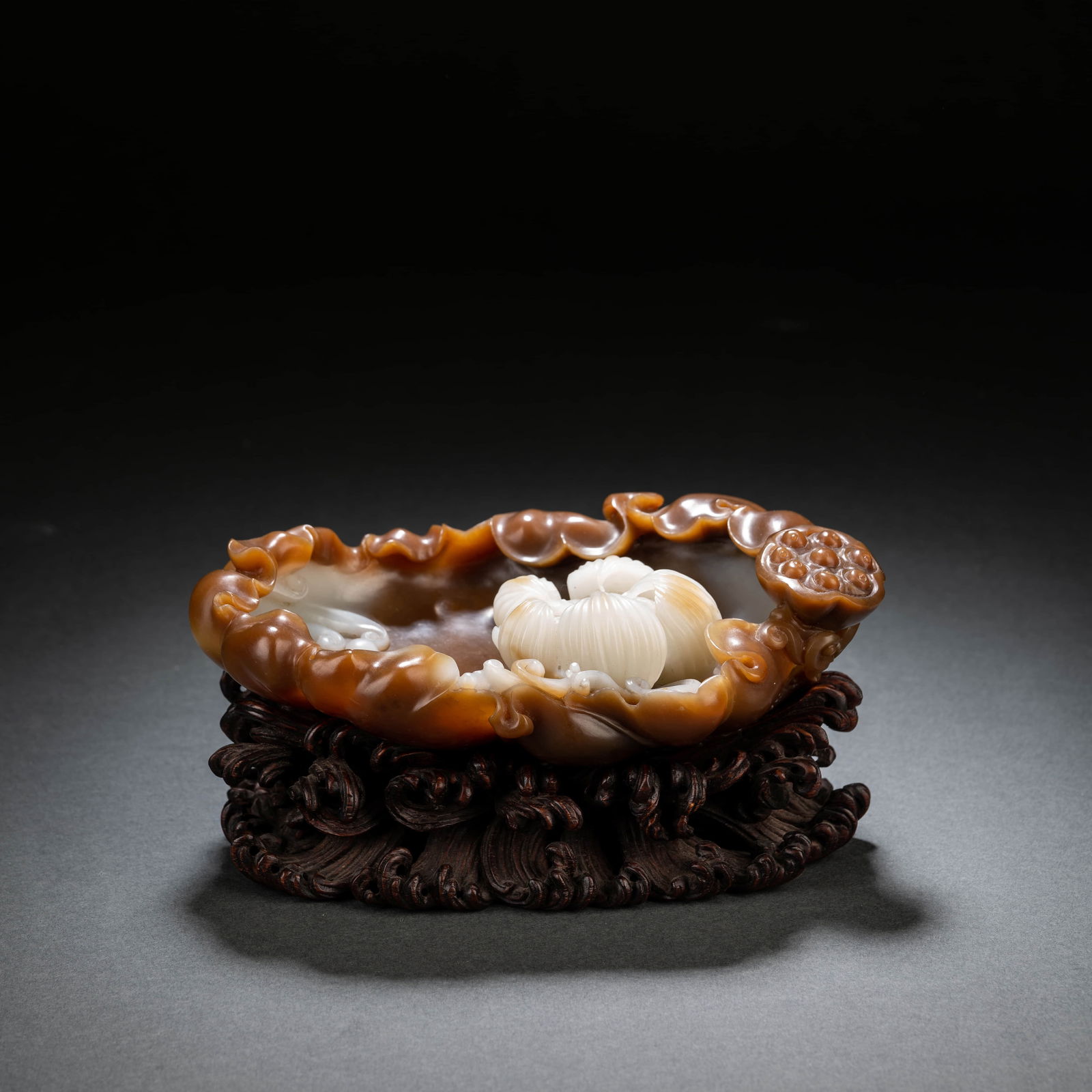 Carved?Brownish?Jade?Lotus-Form?Washer: Name Carved?Brownish?Jade?Lotus-Form?Washer Dimensions Length:16cm; Width:10cm; Height:5cm;? Condition Additional photographs and condition reports are available upon request as a courtesy to