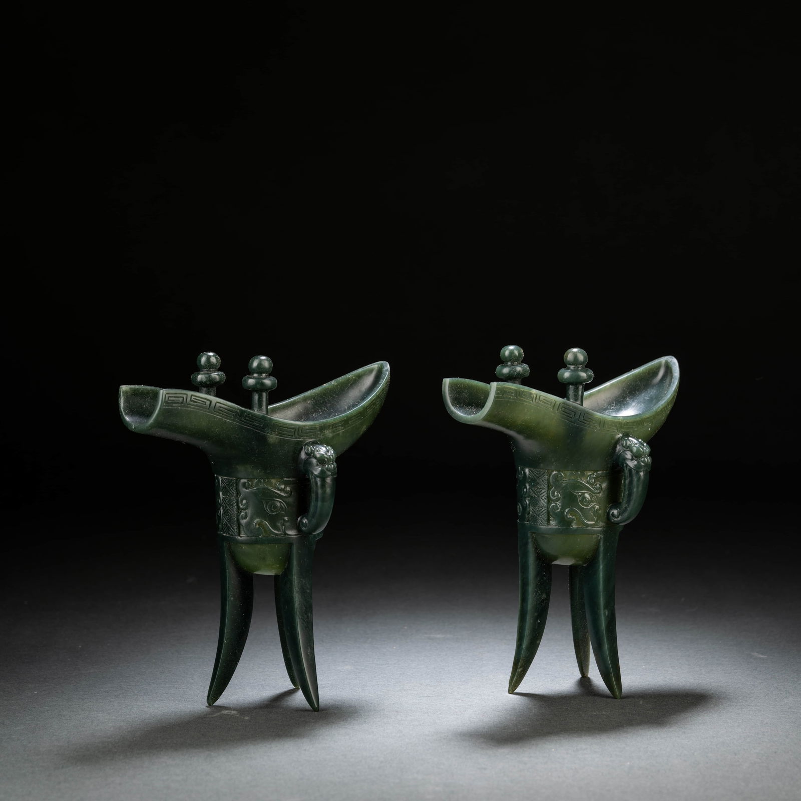 Pair?Of?Spinach?Green?Jade?Cups: Name Pair?Of?Spinach?Green?Jade?Cups Dimensions Length:12.5cm; Width:5.5cm; Height:13cm;? Condition Additional photographs and condition reports are available upon request as a courtesy to our