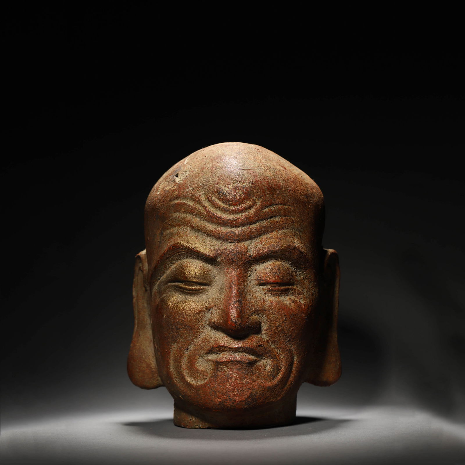 Gilt Painted Iron Head of Arhat: Name Gilt Painted Iron Head of Arhat Dimensions Height:23.5cm, Length:18cm, ? Condition Additional photographs and condition reports are available upon request as a courtesy to our clients.