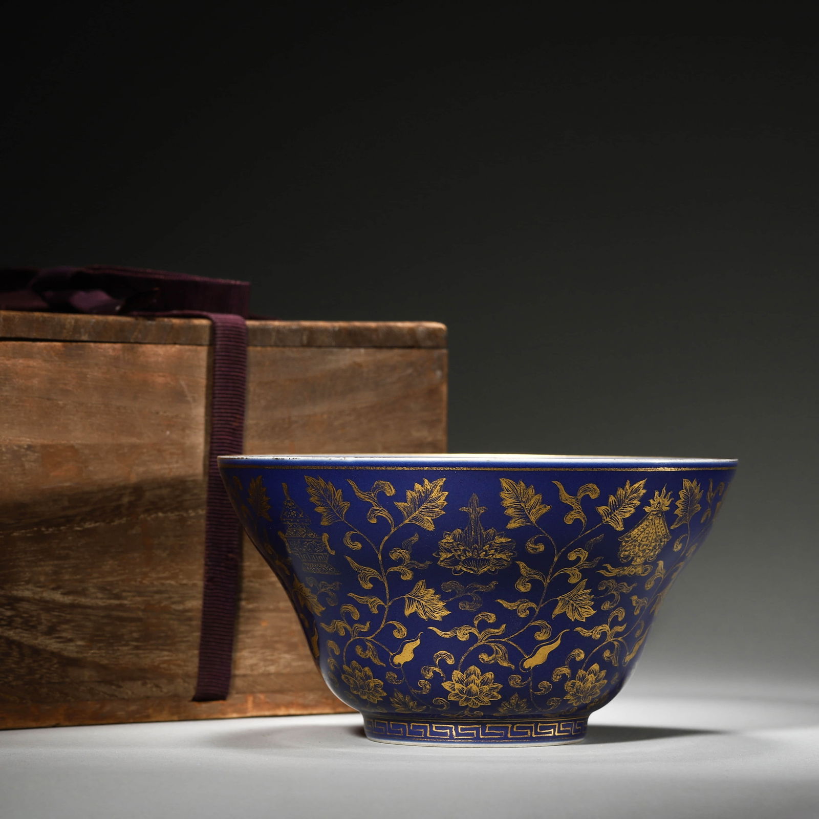 Blue Ground Gilt Eight Treasures Bowl: Name Blue Ground Gilt Eight Treasures Bowl Dimensions Diam.15cm Height:8cm Condition Additional photographs and condition reports are available upon request as a courtesy to our clients. Any