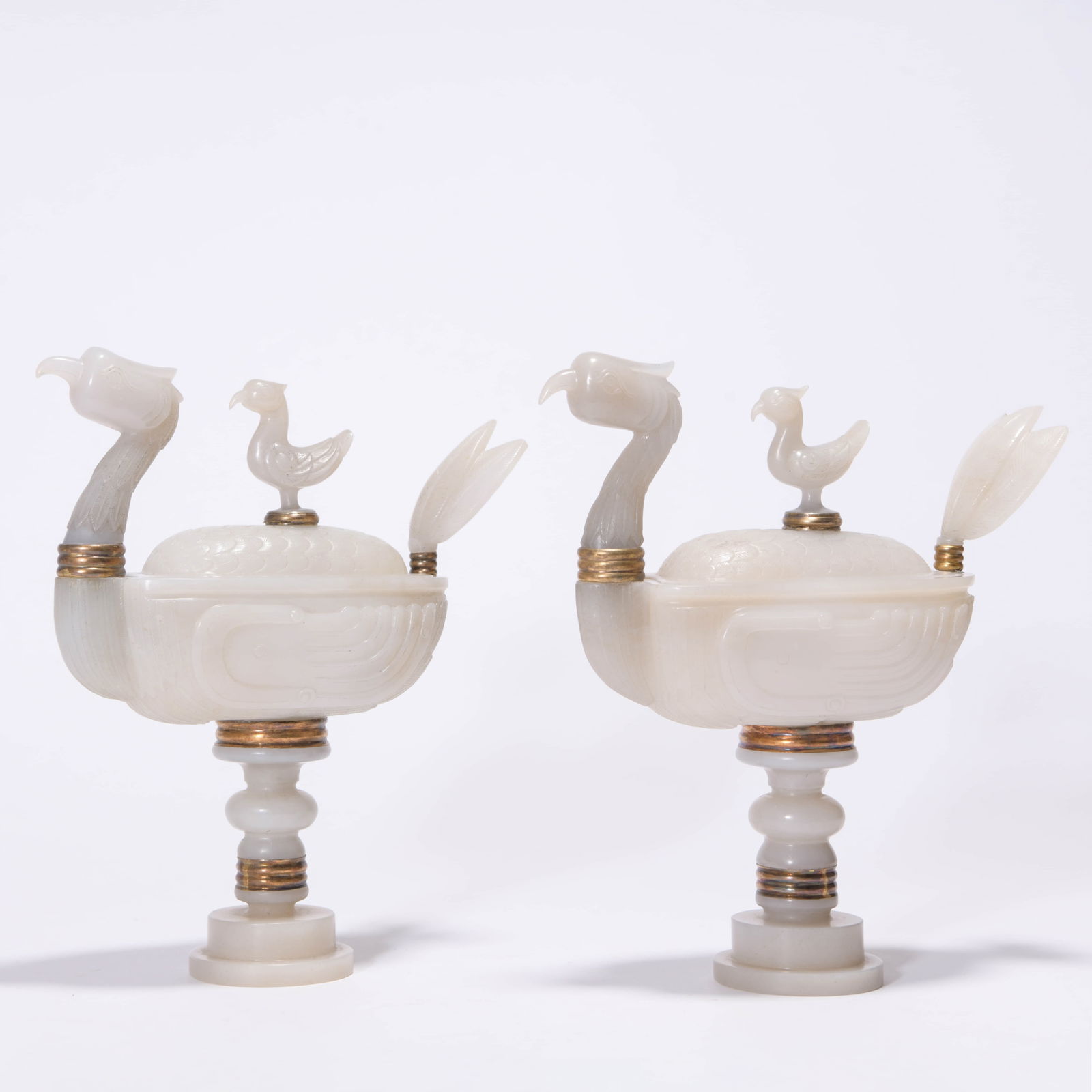 Pair?of?White?Jade?Duck-Form?Censers: Name Pair?of?White?Jade?Duck-Form?Censers Dimensions Length:18cm; Width:7.5cm; Height:22cm;? Condition Additional photographs and condition reports are available upon request as a courtesy to