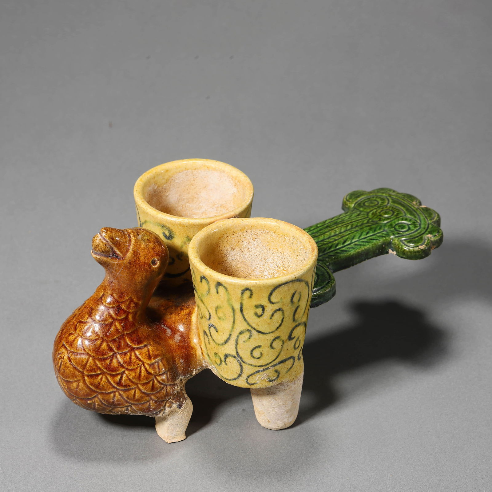 Pottery Cup?Duck-Form Vessel: Name Pottery Cup?Duck-Form Vessel Dimensions Length:20cm, Width:11.5cm, Height:9.5cm, ? Condition Additional photographs and condition reports are available upon request as a courtesy to our