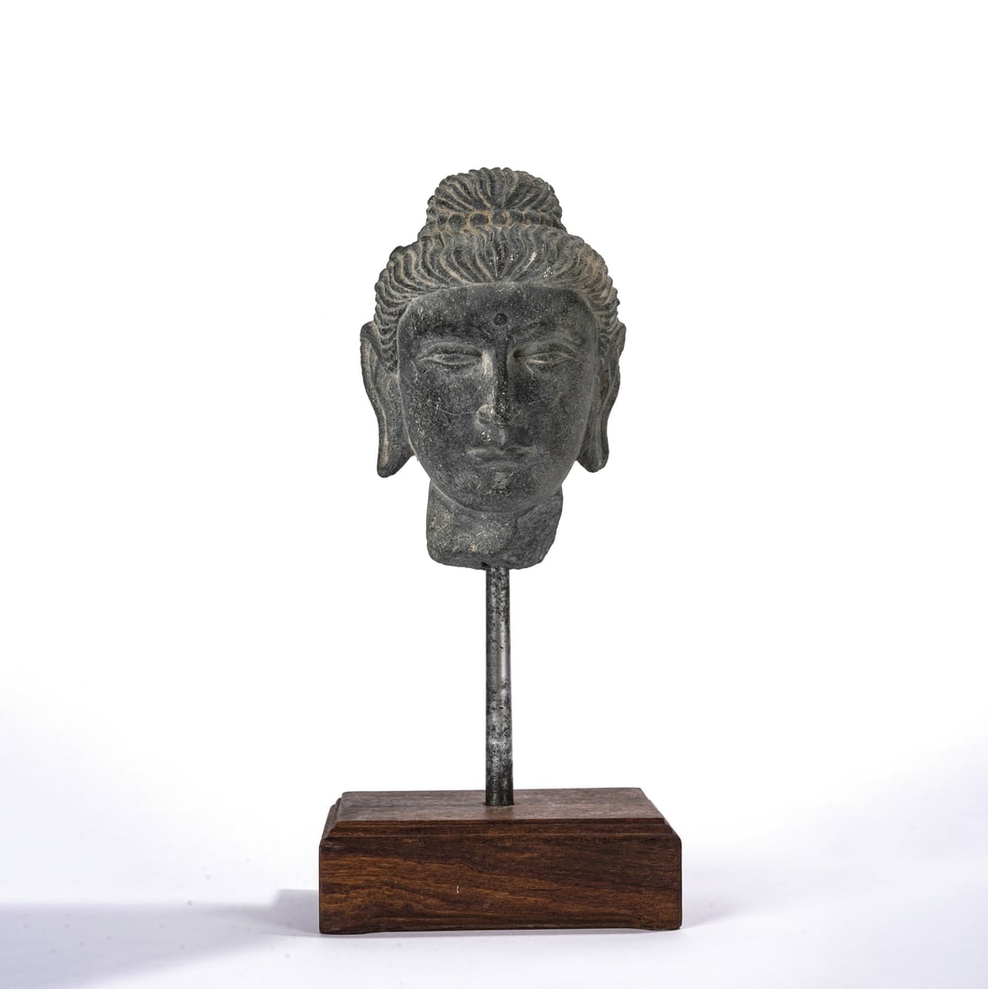 Carved?Stone?Head?of?Buddha, ?Gandhara?Style: Name Carved?Stone?Head?of?Buddha, ?Gandhara?Style Dimensions 12x12x17cm, Total 14x12x29cm Condition Additional photographs and condition reports are available upon request as a courtesy to our