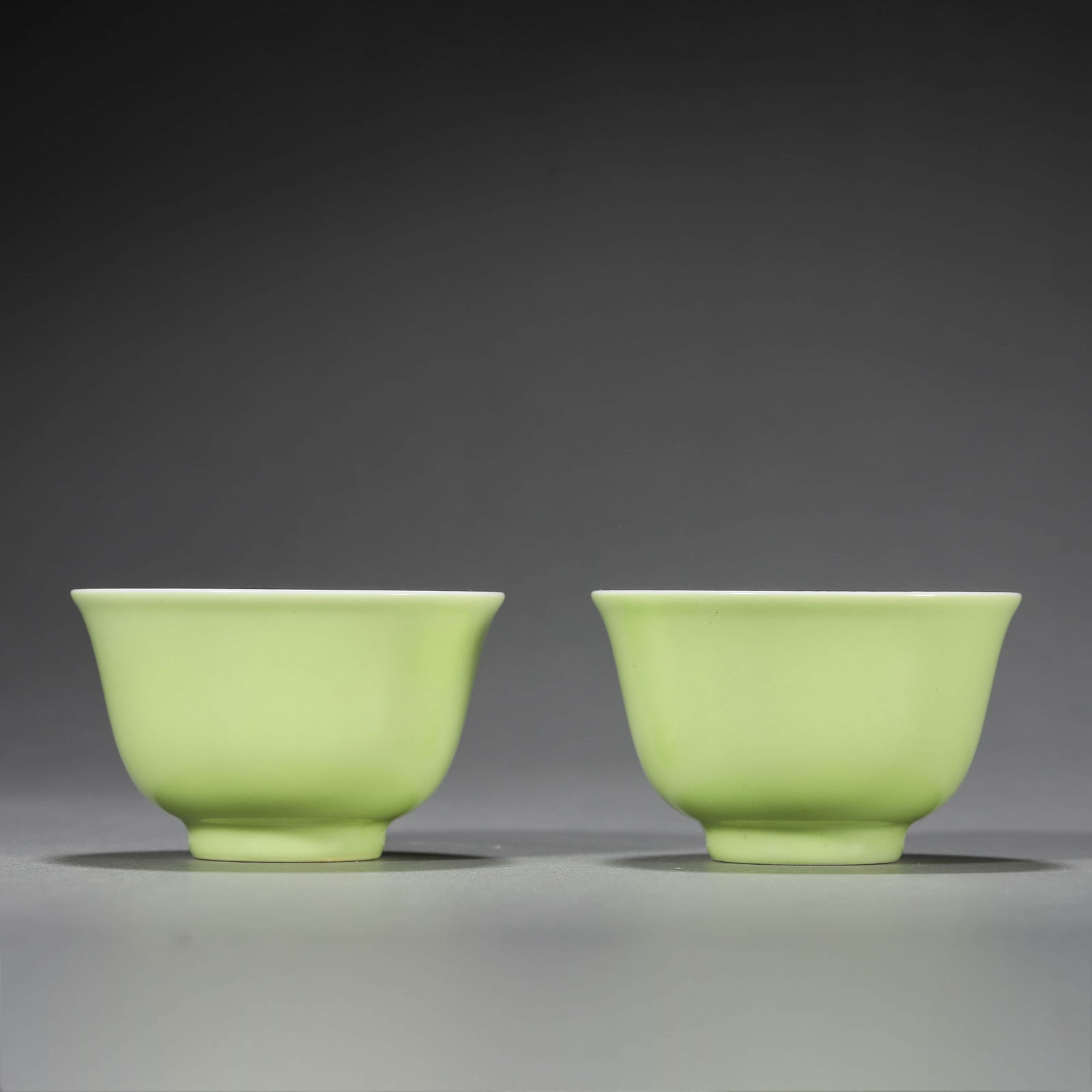 Pair of Apple Green Glaze Cups: Name Pair of Apple Green Glaze Cups Dimensions Diam.7.7cm, Height:4.8cm, ? Condition Additional photographs and condition reports are available upon request as a courtesy to our clients. Any
