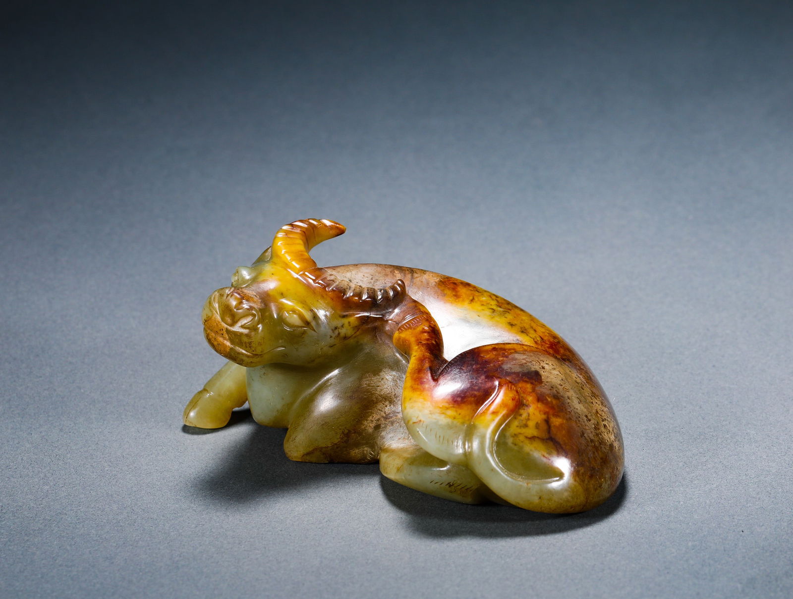 Han Dynasty Hetian jade ox: Name Han Dynasty Hetian jade ox Dimensions H:5cmW:103cmWeight:360g Condition Additional photographs and condition reports are available upon request as a courtesy to our clients.