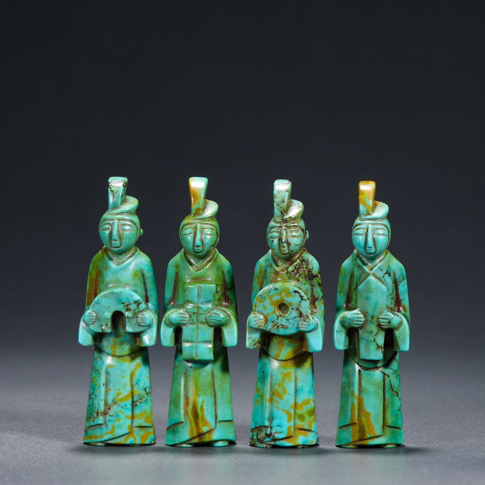 Turquoise figure ornaments (1 of 5)