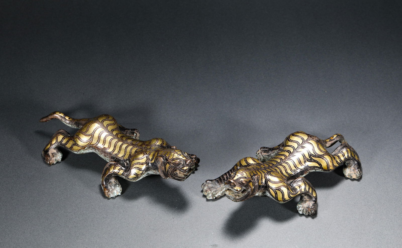 A pair of bronze tigers inlaid with gold from the Han Dynasty (1 of 7)