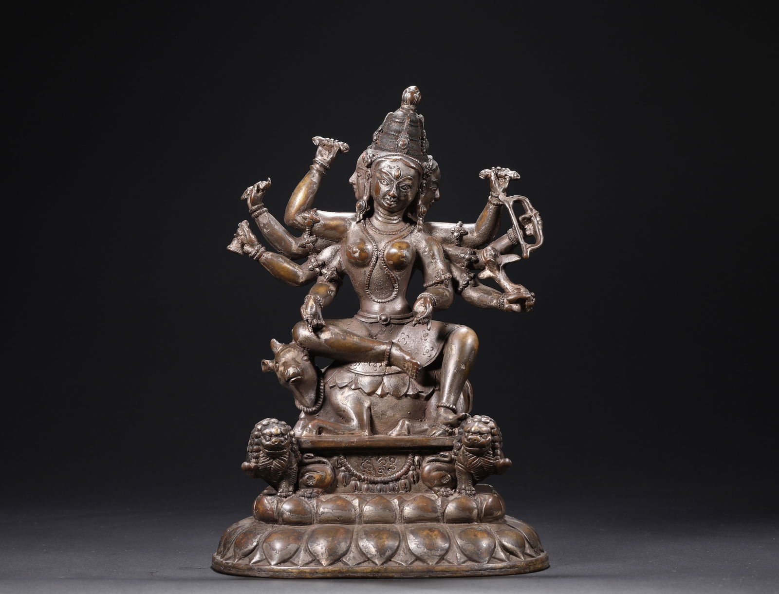 A 12th-century alloy copper statue of Guanyin with three faces and eight arms (1 of 9)
