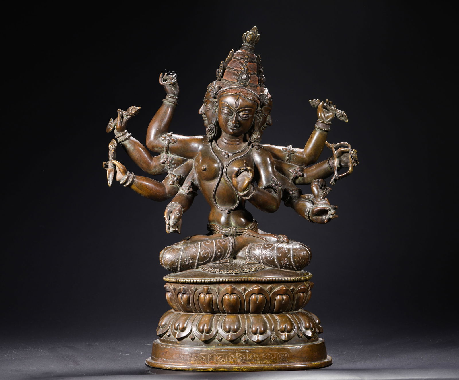 13th-century alloy copper statue of Guanyin with three faces and eight arms (1 of 10)
