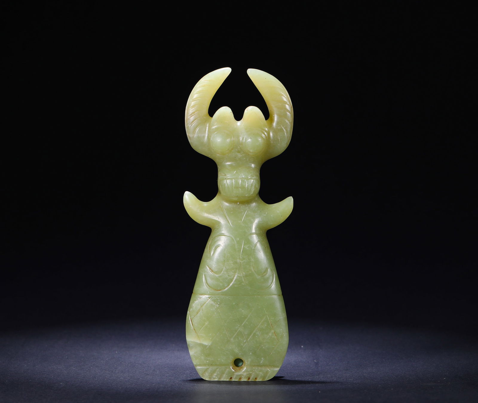 HONGSHAN PERIOD OX HEAD SUN GOD: Name HONGSHAN PERIOD OX HEAD SUN GOD Dimensions H:14.5cm W:5.2cm Weight:160g his is a standing beast head divine human pendant from the Hongshan period, carved from light yellow jade. The head is in t