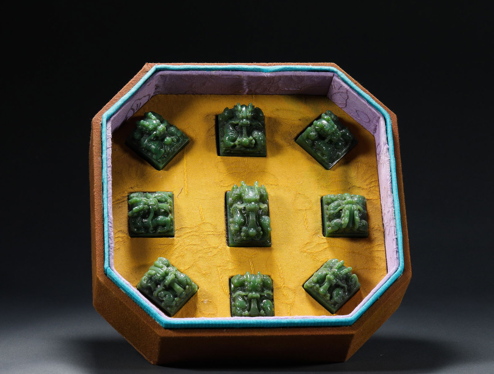 QING DYNASTY, HETIAN JADE SEAL: Name QING DYNASTY, HETIAN JADE SEAL Dimensions H:3cm W:3cm Weight:520g This is a set of nine seals with dragon patterns carved on jade in the style of the Qing Dynasty court. There are nine seals in t
