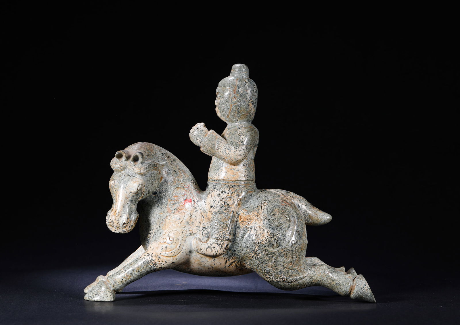 TANG DYNASTY, HETIAN JADE FIGURE ON HORSEBACK: Name TANG DYNASTY, HETIAN JADE FIGURE ON HORSEBACK Dimensions H:18cm W:22cm Weight:1820g Condition Additional photographs and condition reports are available upon request as a cou