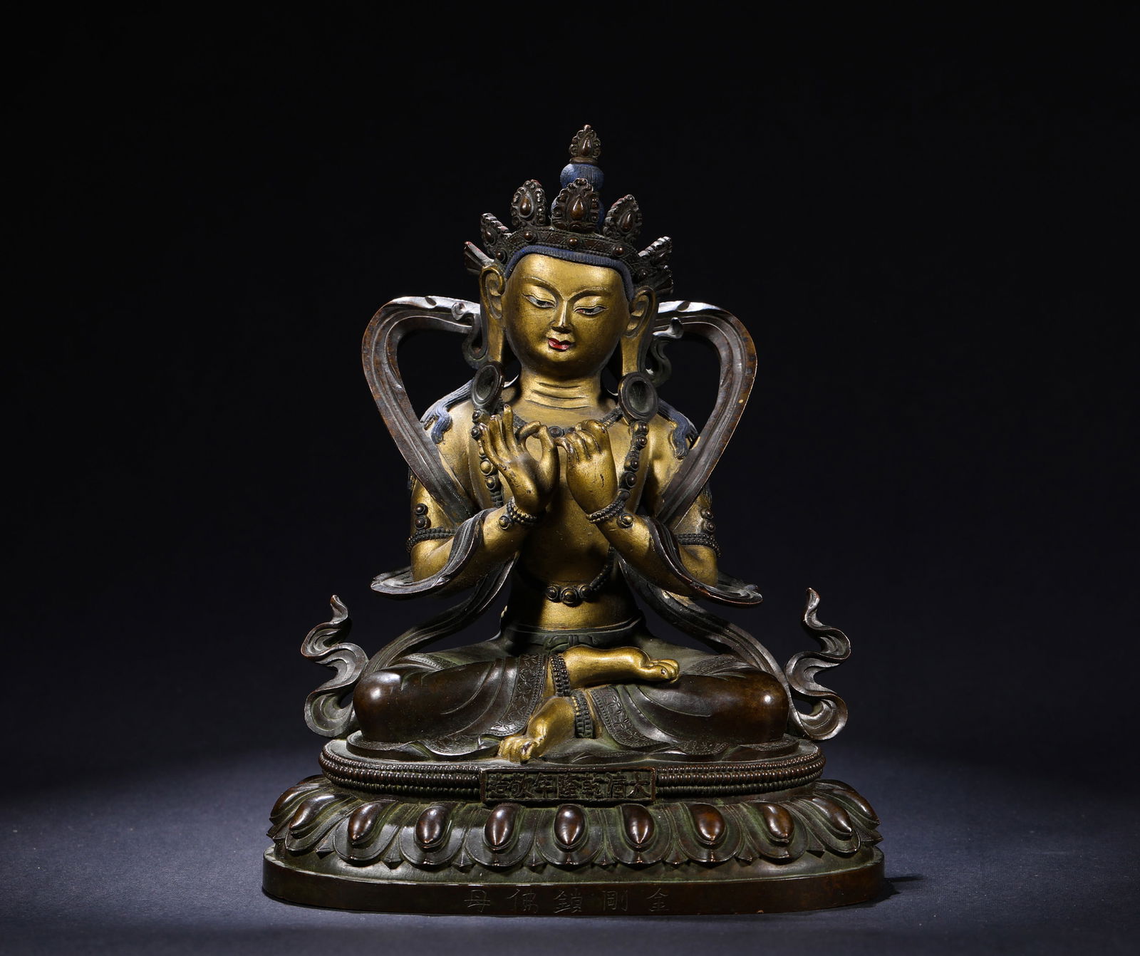 QING DYNASTY, GILDED BRONZE BUDDHA STATUE OF EMPEROR QIANLONG: Name QING DYNASTY, GILDED BRONZE BUDDHA STATUE OF EMPEROR QIANLONG Dimensions H:18.5cm W:14.3cm Weight:1660g This is an imperially made copper seated statue of Vajra Lock Buddha Mother with partial gi