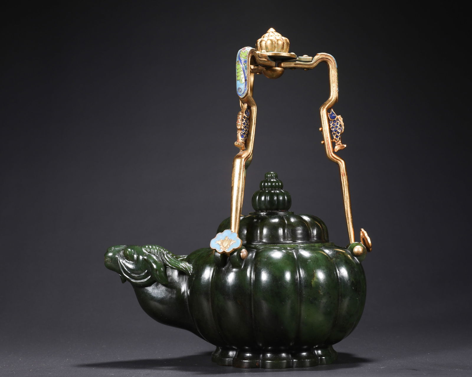 QING DYNASTY, HETIAN JADE HANDLE TEAPOT: Name QING DYNASTY, HETIAN JADE HANDLE TEAPOT Dimensions H:23cm W:18cm Weight:890g Condition Additional photographs and condition reports are available upon request as a courtesy t