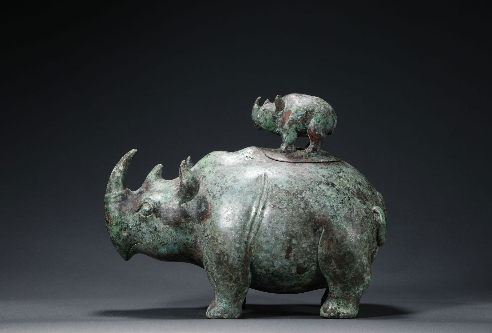 HAN DYNASTY, COPPER RHINOCEROS INCENSE: Name HAN DYNASTY, COPPER RHINOCEROS INCENSE Dimensions H:15cm W:20.5cm Weight:2140g Condition Additional photographs and condition reports are available upon request as a courtesy