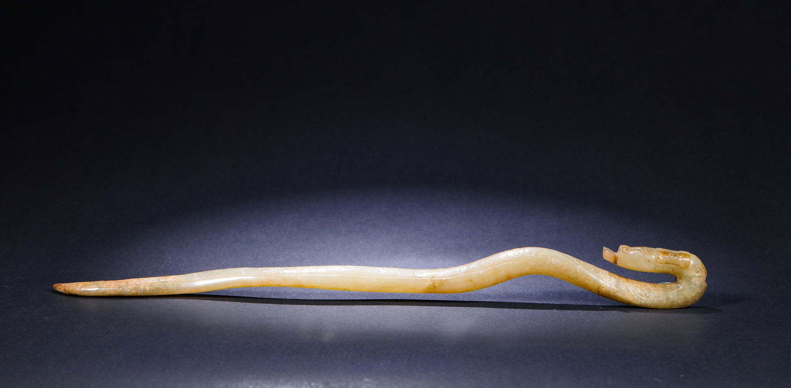 HAN DYNASTY, HETIAN JADE DRAGON HAIRPIN: Name HAN DYNASTY, HETIAN JADE DRAGON HAIRPIN Dimensions L:29cm Weight:90g Condition Additional photographs and condition reports are available upon request as a courtesy to our cli