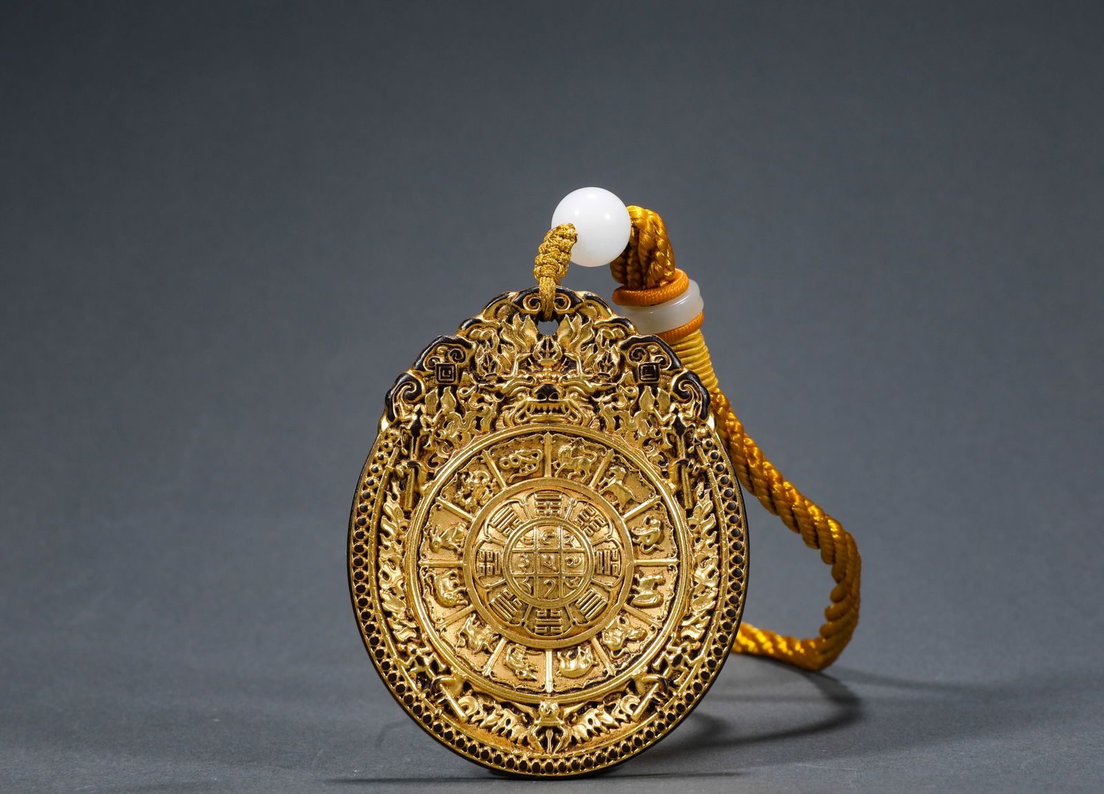 YONGLE BRONZE GILT NINE PALACES EIGHT TRIGRAMS PLAQUE OF THE MING DYNASTY: Name YONGLE BRONZE GILT NINE PALACES EIGHT TRIGRAMS PLAQUE OF THE MING DYNASTY Dimensions H:6.2cm W:5cm Weight:70g Condition Additional photographs and condition reports are avail