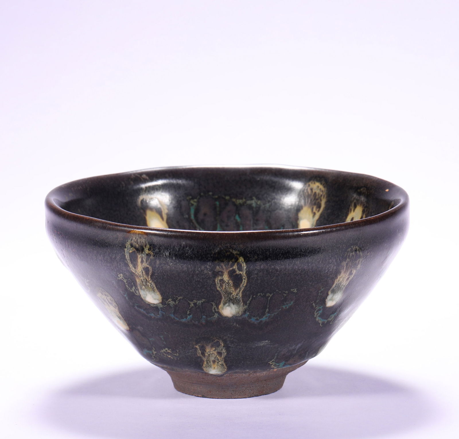 SONG DYNASTY, KILN-TRANSFORMED JIAN KILN TEA BOWL: Name SONG DYNASTY, KILN-TRANSFORMED JIAN KILN TEA BOWL Dimensions H:6.5cmD:12.3cm Condition Additional photographs and condition reports are available upon request as a courtesy t